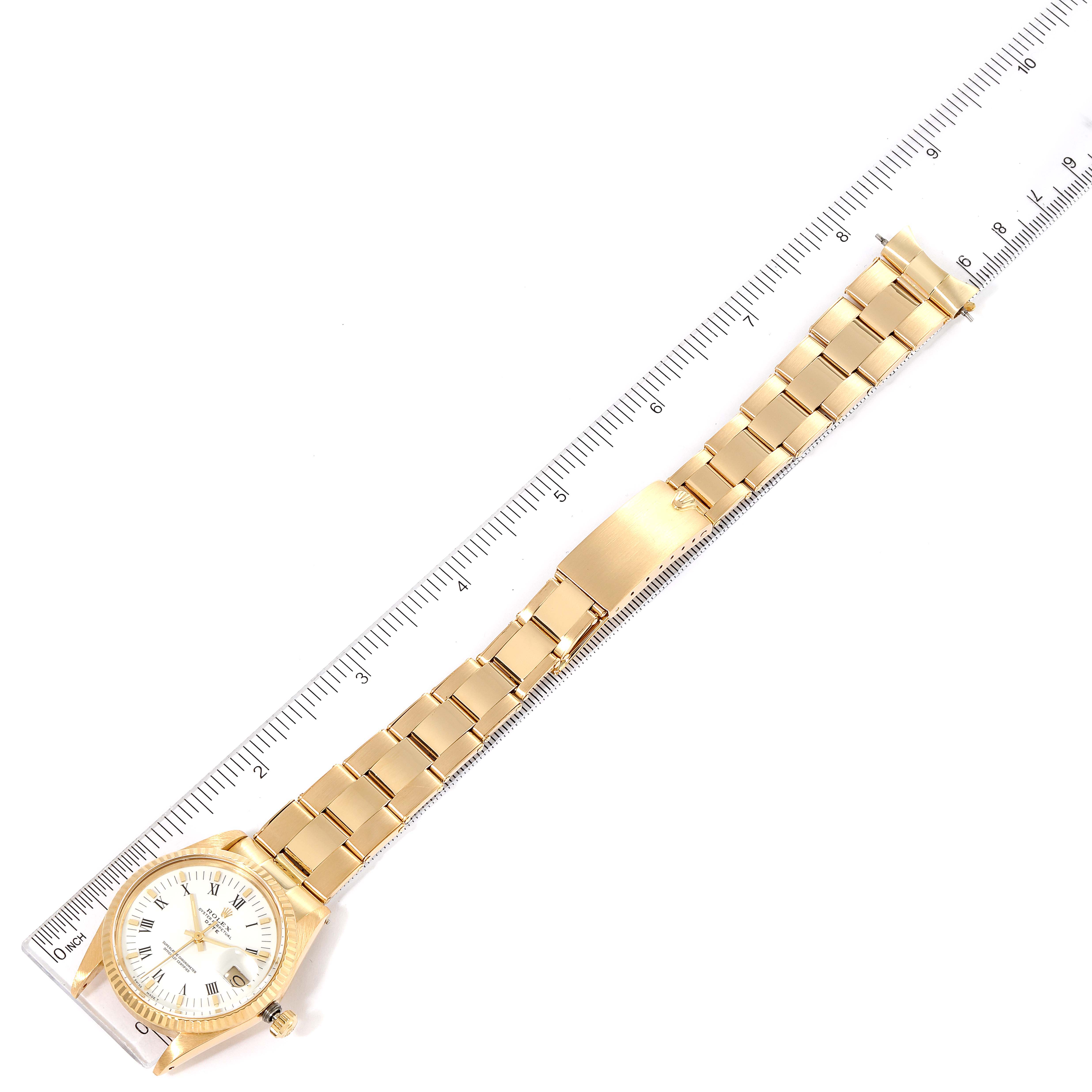 The image shows a Rolex Vintage Collection 15038 Men's Yellow Gold White Dial 15038 Men's Yellow Gold White Dial watch fully extended, with the face and entire strap visible, next to a ruler for scale.