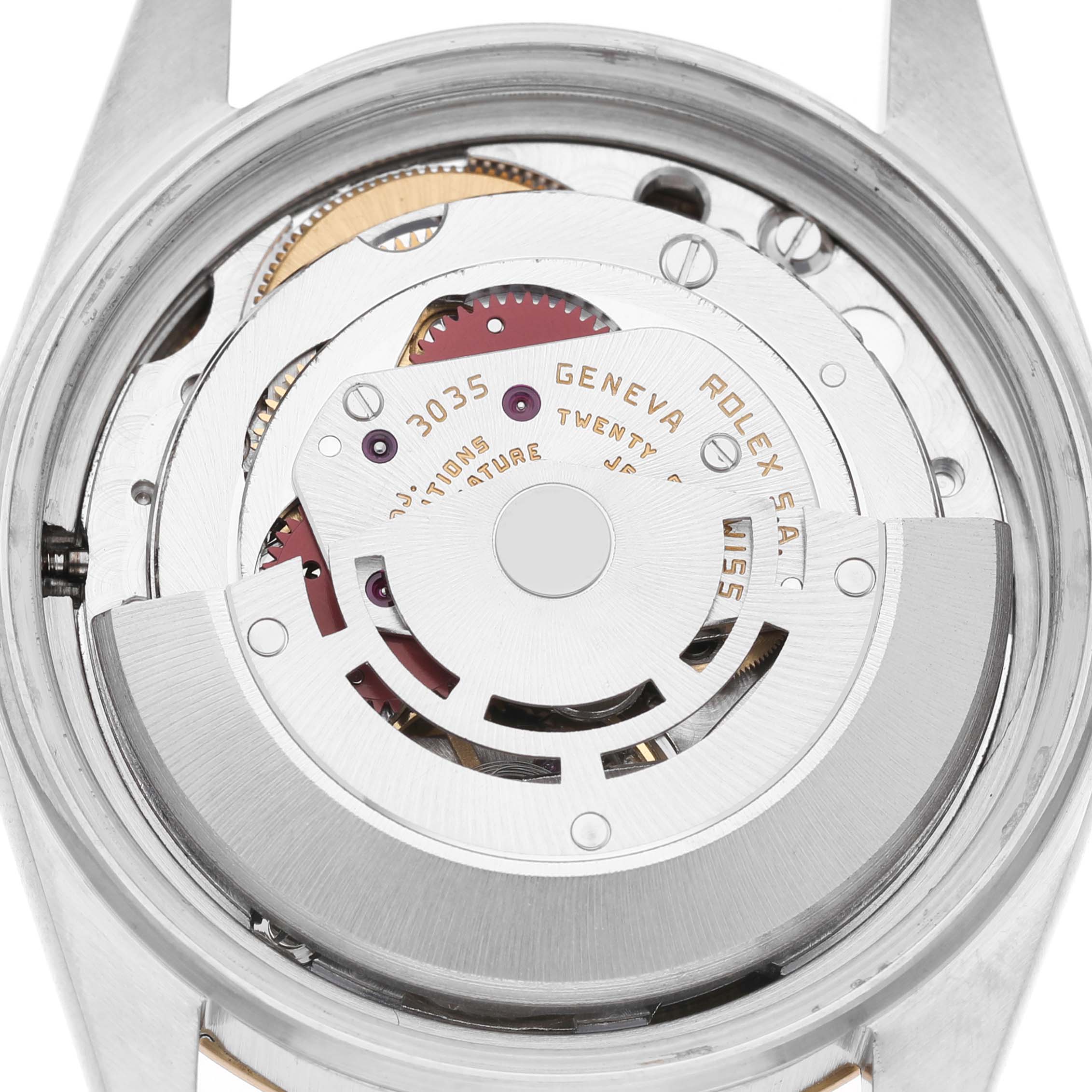 The image shows the movement of a Rolex Vintage Collection 16013 Men's Steel and Gold (two tone) Champagne Dial watch, highlighting the rotor and internal mechanics.