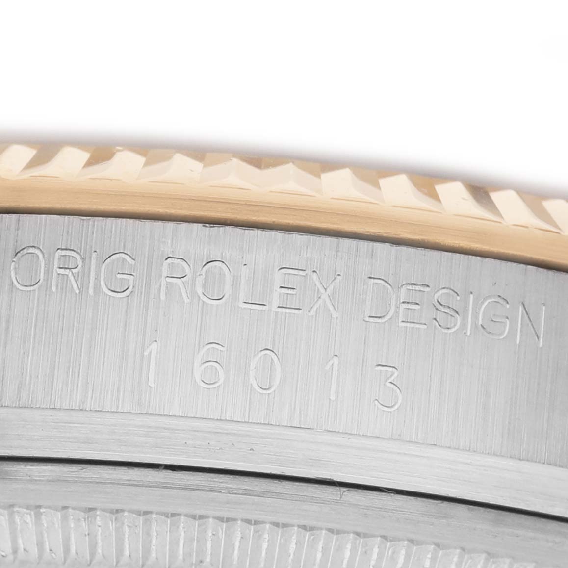 The image shows a close-up of the case side of a Rolex Vintage Collection 16013 Men's Steel and Gold (two tone) Champagne Dial watch, displaying the model number "16013" and design engraving.
