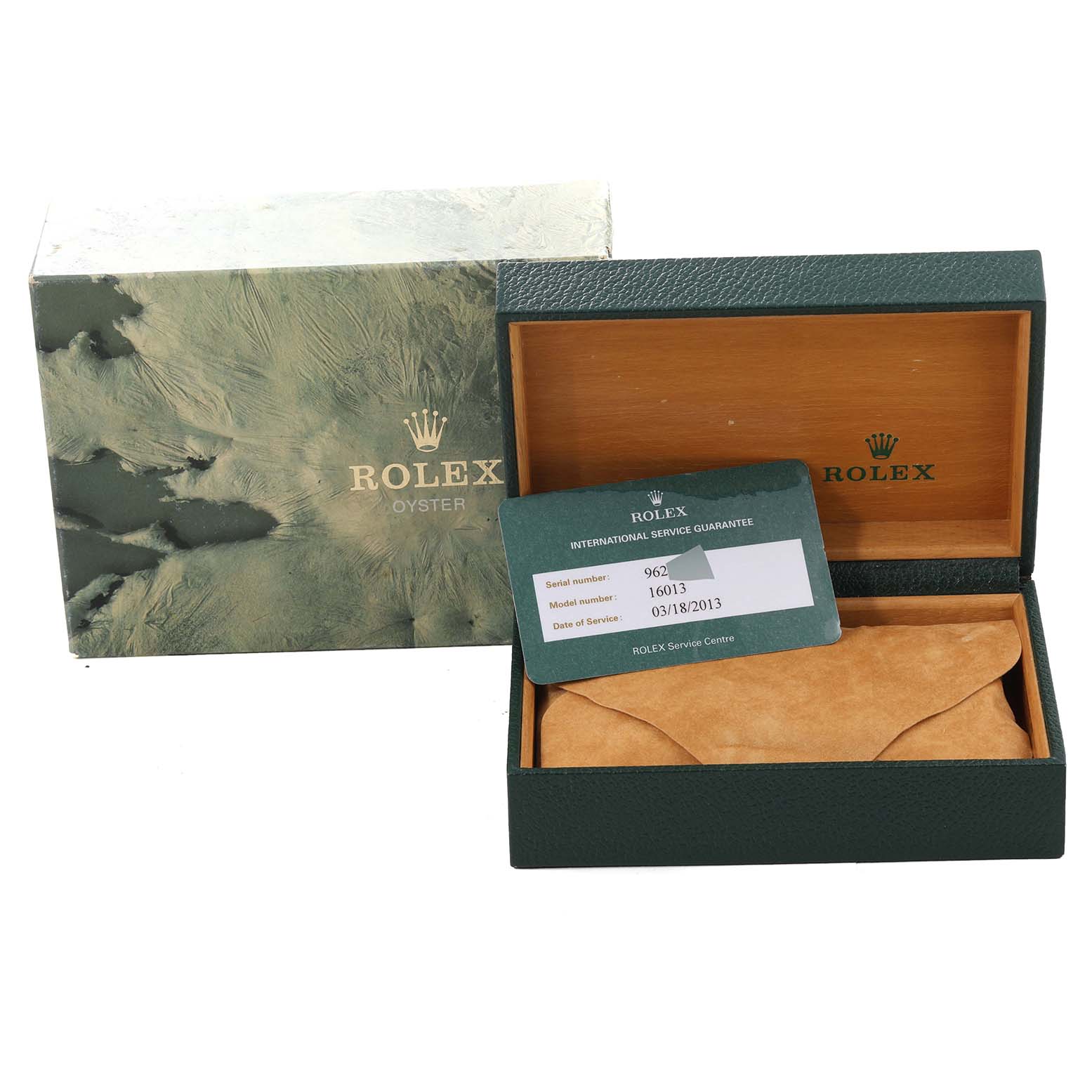 The image shows the packaging and documentation of a Vintage Collection model by Rolex, including a box, a warranty card, and protective pouch.