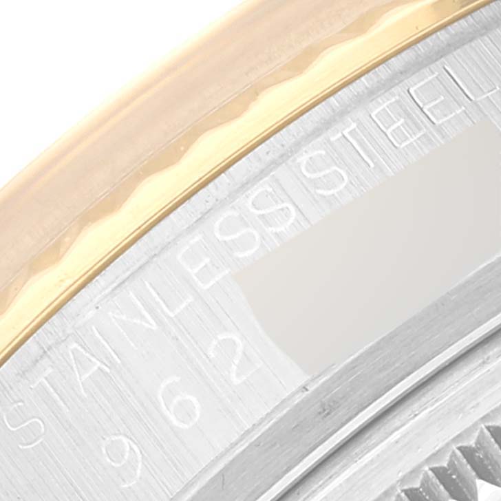 Close-up of the Rolex Vintage Collection 16013 Men's Steel and Gold (two tone) Black Dial 16013 Men's Steel and Gold (two tone) Black Dial watch shows the stainless steel case and part of the bezel.