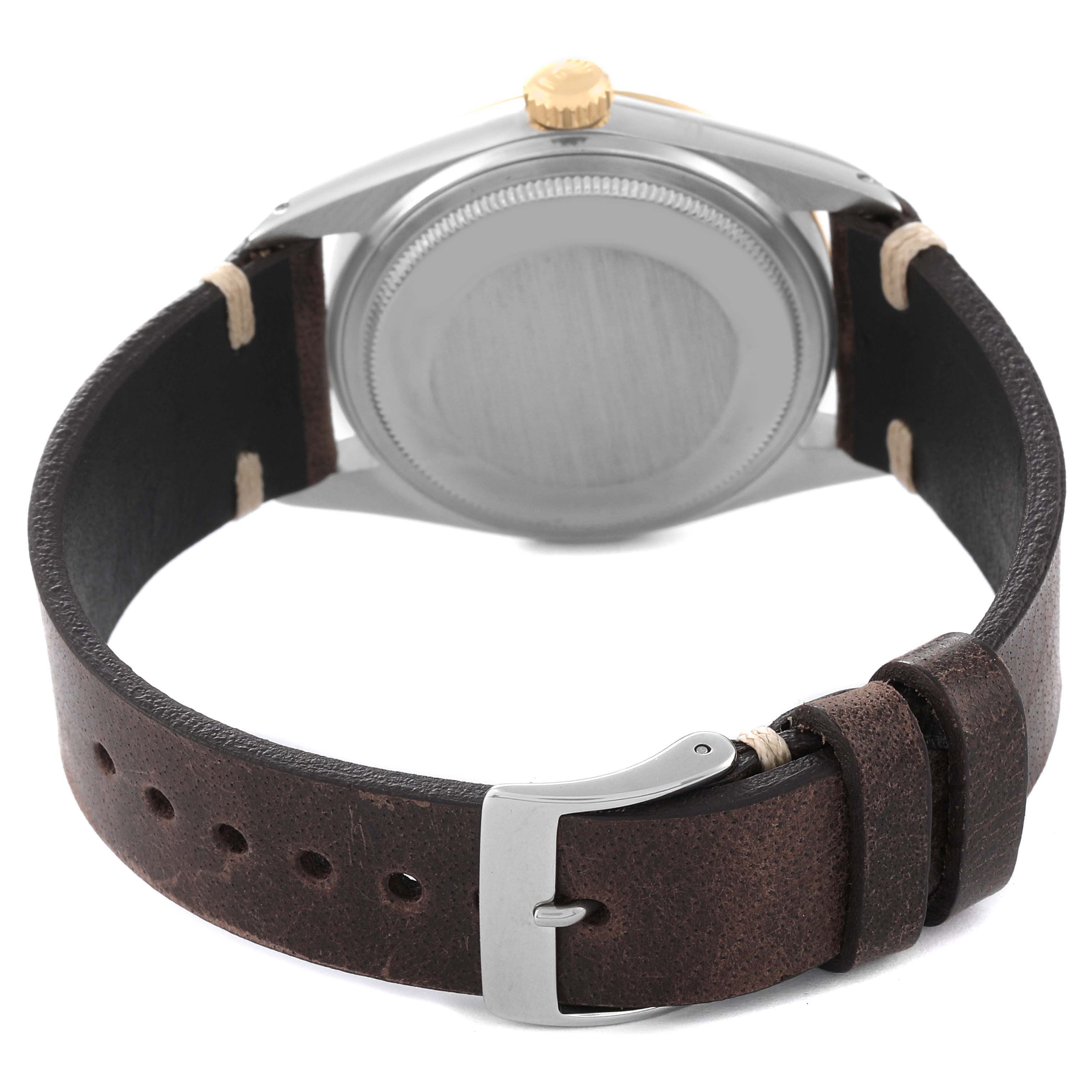 The image shows the back of a Rolex Vintage Collection 16013 Men's Steel and Gold (two tone) Black Dial 16013 Men's Steel and Gold (two tone) Black Dial watch, focusing on the case back, crown, and leather strap with buckle.