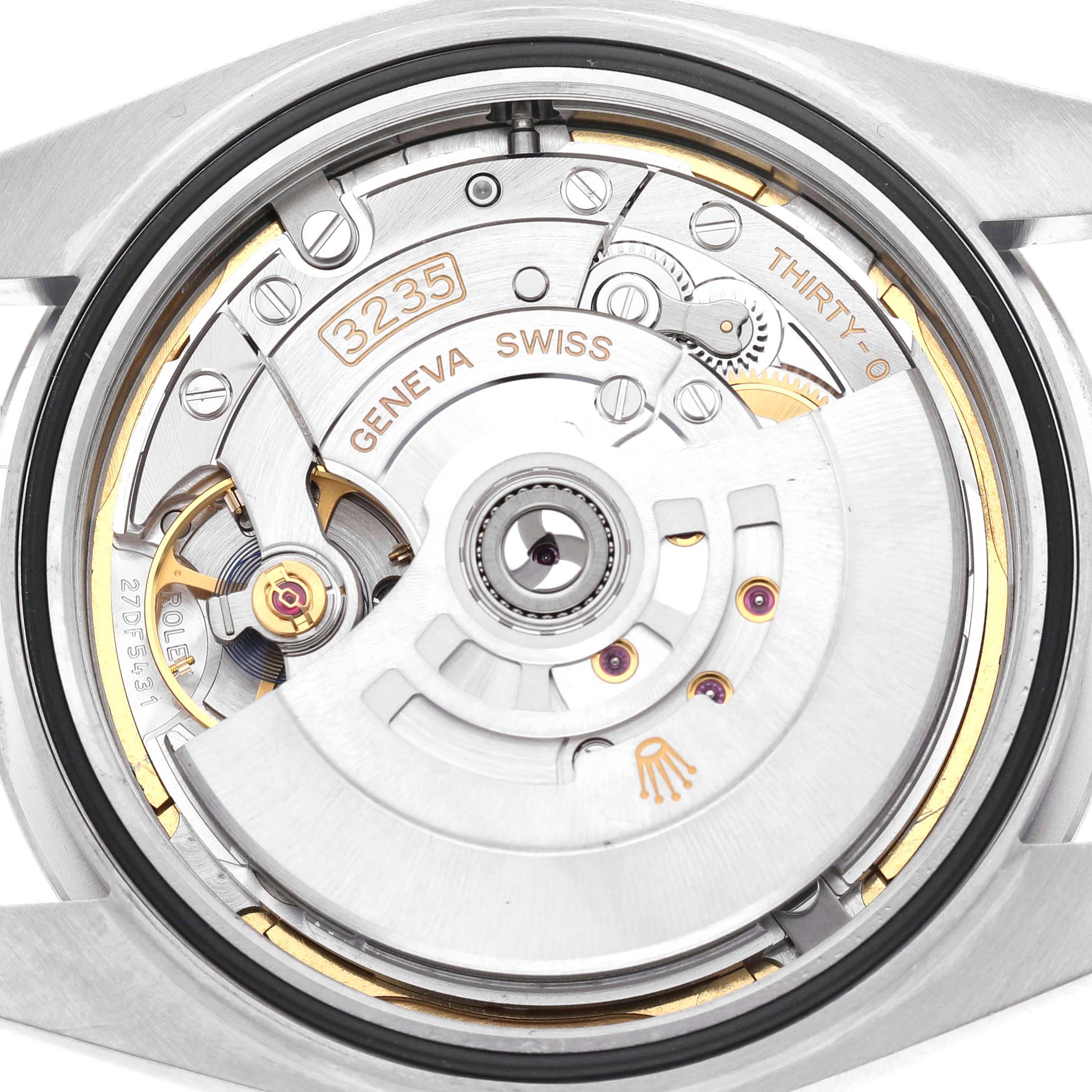 The image shows the movement mechanism of a Rolex Datejust 41 126300 Men's Stainless Steel Blue Dial from a top-down angle.