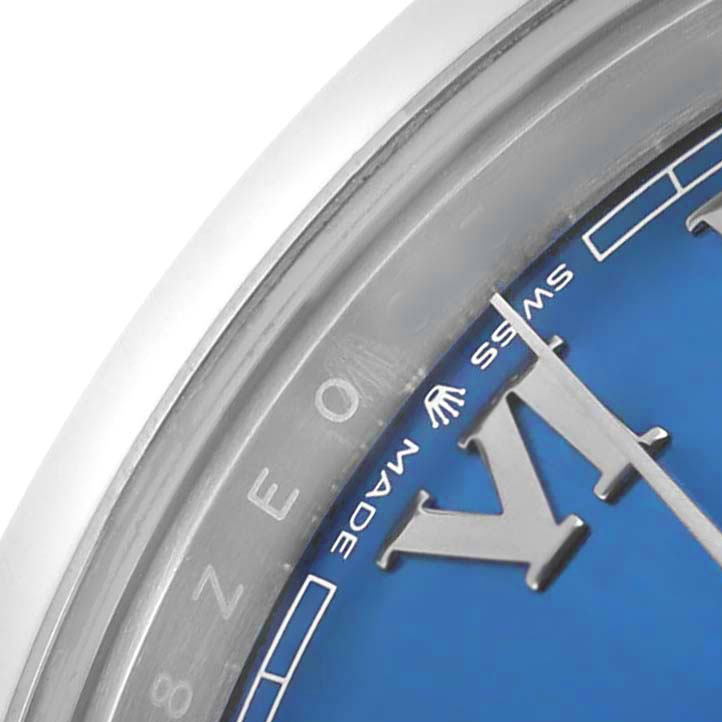 The image shows a close-up of the Rolex Datejust 41 126300 Men's Stainless Steel Blue Dial's dial, focusing on the edge, second hand, and "SWISS MADE" text.
