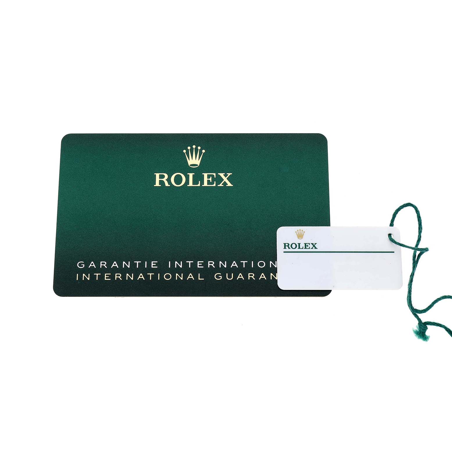 The image shows a Rolex warranty card and tag for the Datejust 41 model, featuring the logo and international guarantee text.