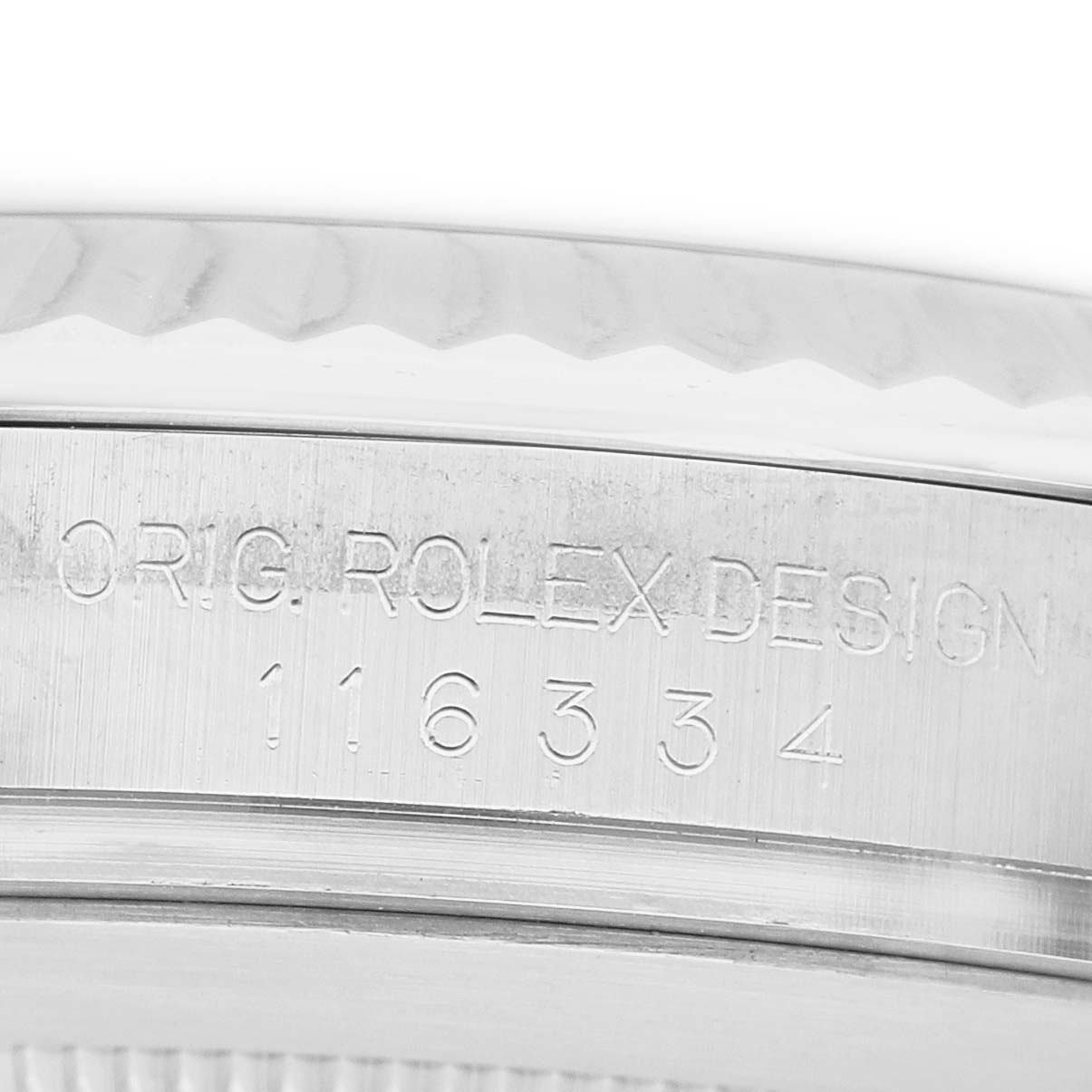 The image shows a close-up of the Rolex Datejust 41 116334 Men's Stainless Steel Blue Dial's case side with engraved model information.
