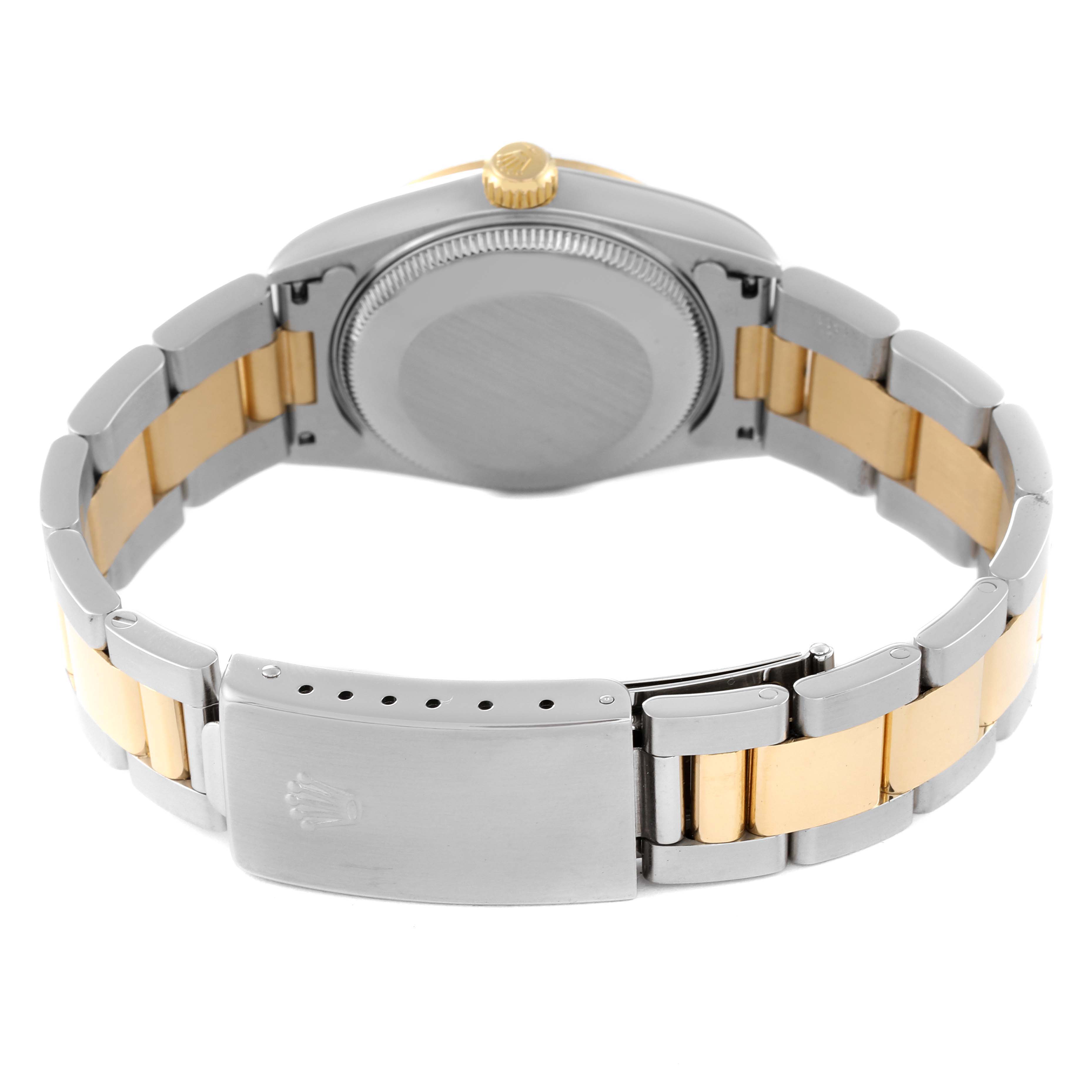 The image shows the back view of a Rolex Mid-Size 78273 Women
s Steel and Gold (two tone) Champagne Dial 78273 Women
s Steel and Gold (two tone) Champagne Dial watch, highlighting the case back, crown, and two-tone bracelet.