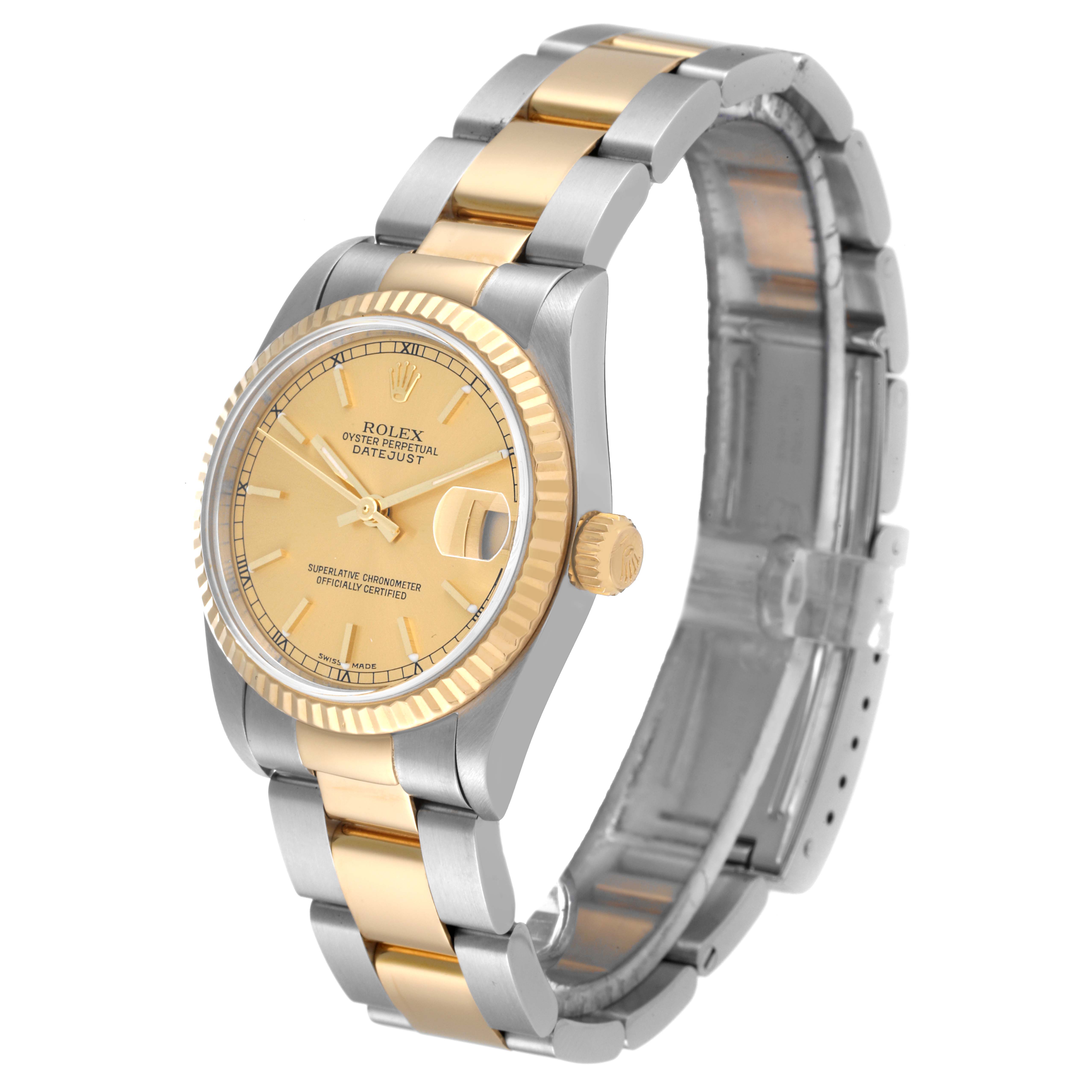 The image shows a side and front angle of a Rolex Mid-Size 78273 Women
s Steel and Gold (two tone) Champagne Dial 78273 Women
s Steel and Gold (two tone) Champagne Dial Datejust, displaying its two-tone bracelet, fluted bezel, and champagne dial.