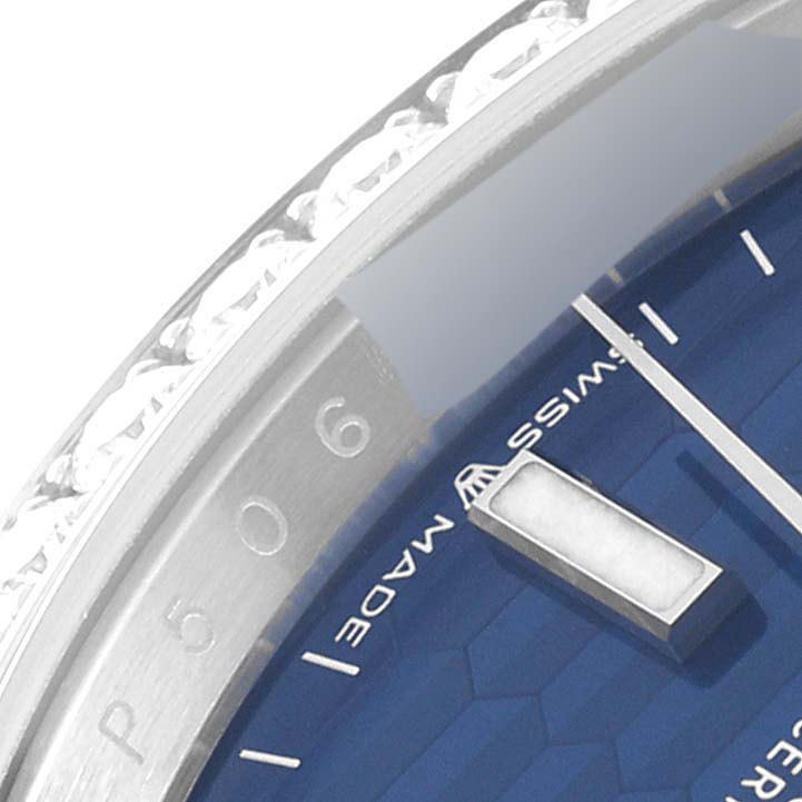 This close-up image shows a partial view of the dial and bezel of the Rolex Datejust 126284 Men's Stainless Steel Blue Dial 126284 Men's Stainless Steel Blue Dial watch.