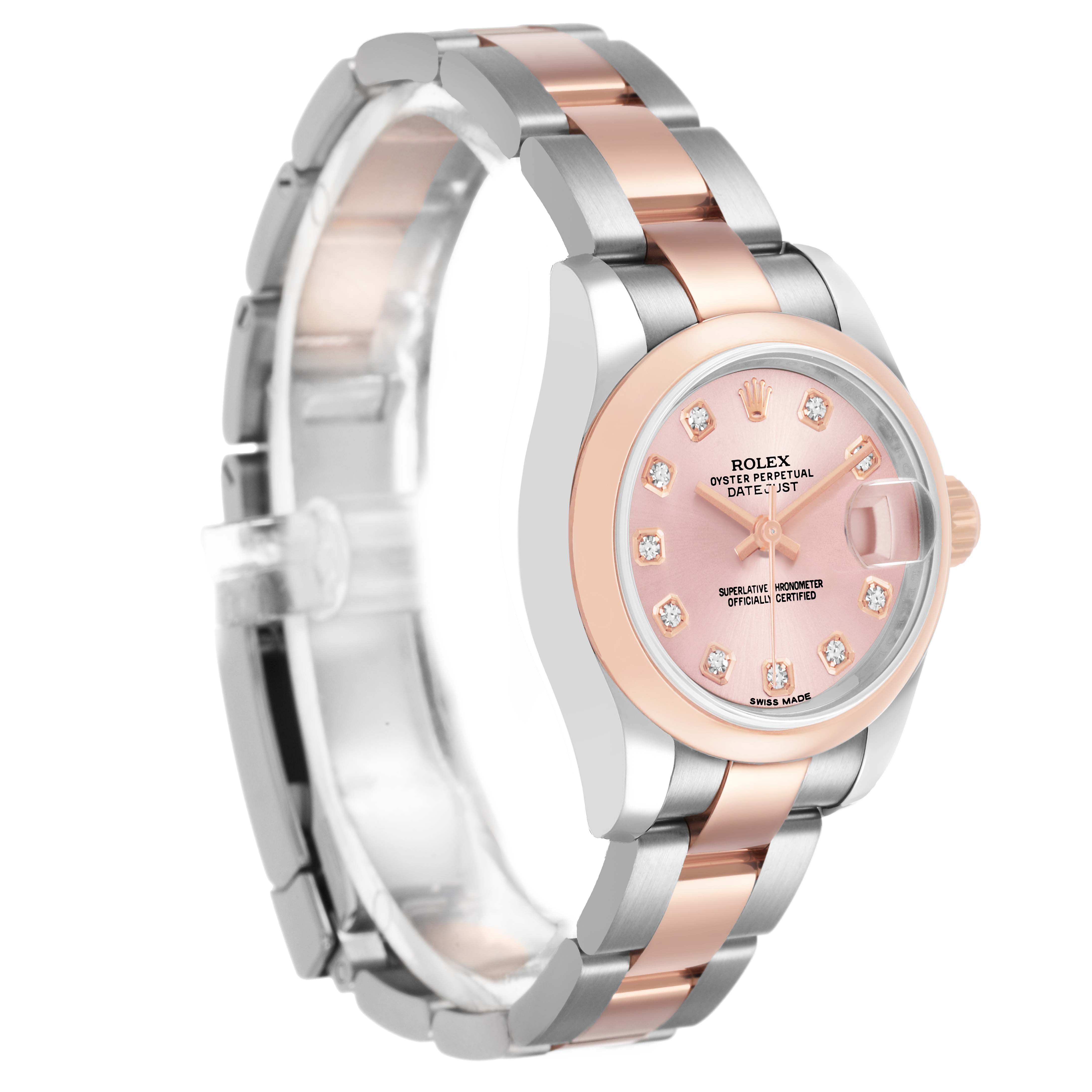 The Rolex Datejust 179161 Women's Steel and Gold (two tone) Pink Dial watch is shown at a three-quarter angle, highlighting the dial, bezel, and bracelet with a combination of rose gold and silver.