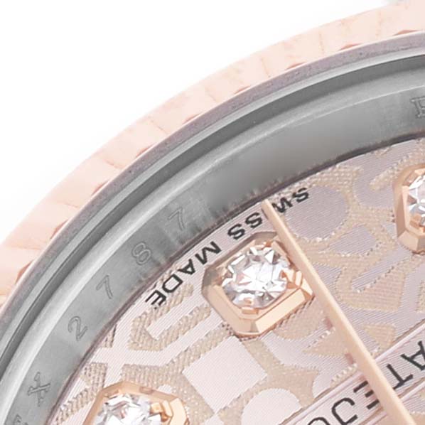 The image shows a close-up of the dial's edge, diamond hour markers, and the rehaut on the Rolex Datejust 179171 Women's Steel and Gold (two tone) Pink Dial.