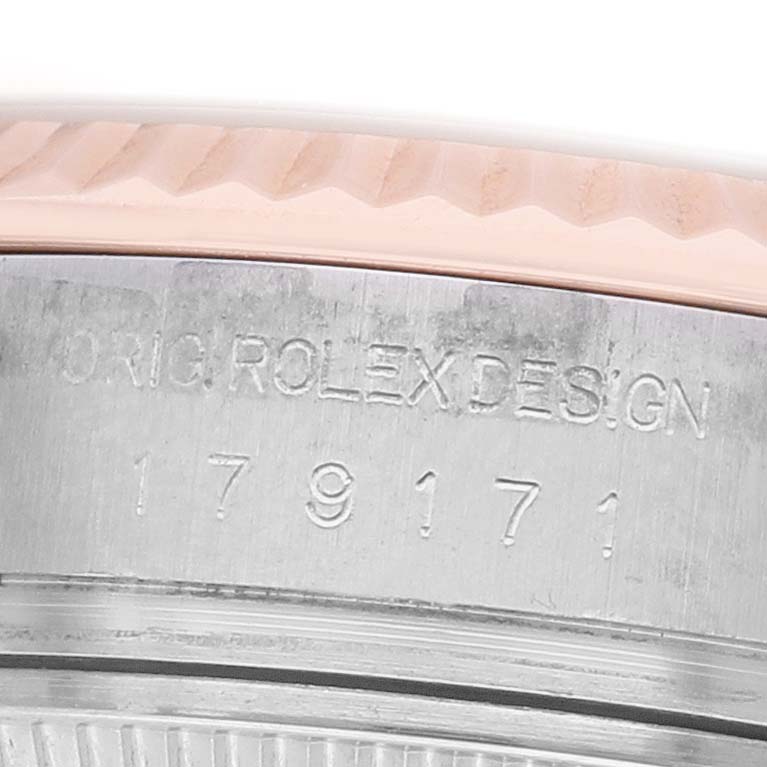 The image shows the side engraving of a Rolex Datejust 179171 Women's Steel and Gold (two tone) Pink Dial, featuring the model and origin details.
