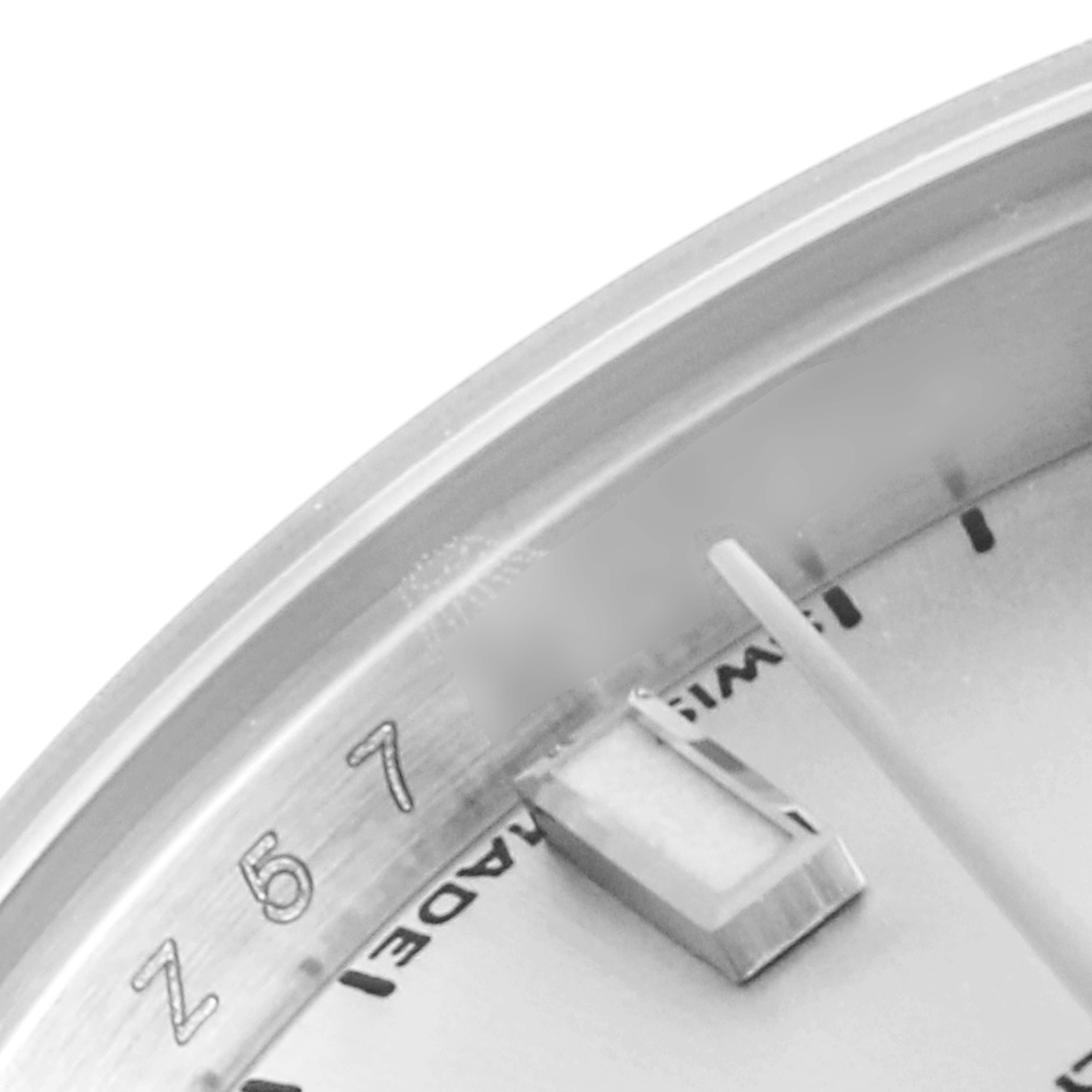 The image shows a close-up of the dial
s edge and hour marker of a Rolex Datejust 179174 Women
s Stainless Steel Silver Dial 179174 Women
s Stainless Steel Silver Dial watch.