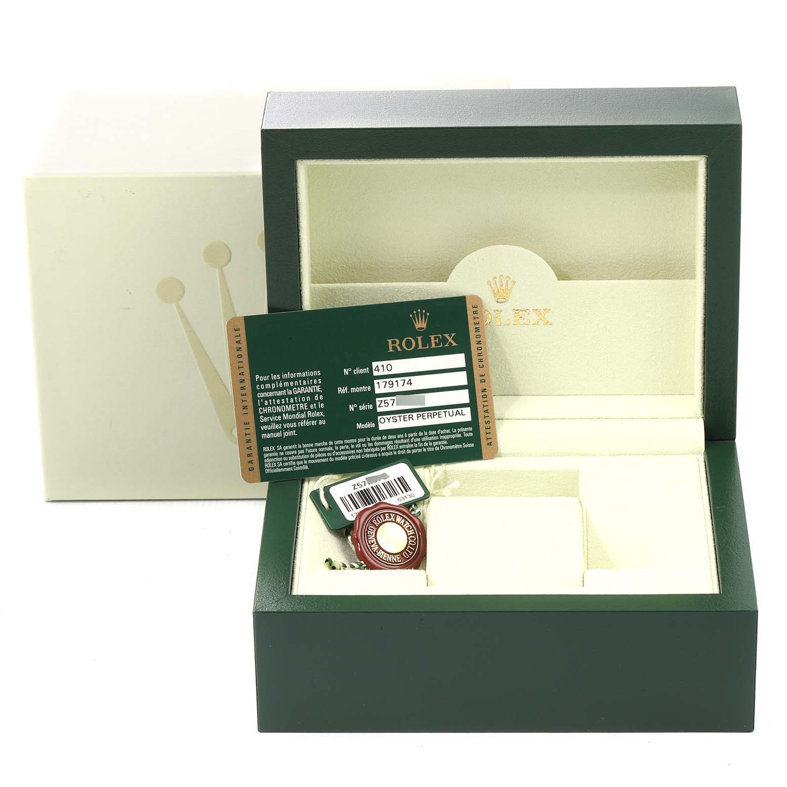 The image shows the open box, warranty card, and tag for a Rolex Datejust 179174 Women
s Stainless Steel Silver Dial 179174 Women
s Stainless Steel Silver Dial watch, along with its certificate.