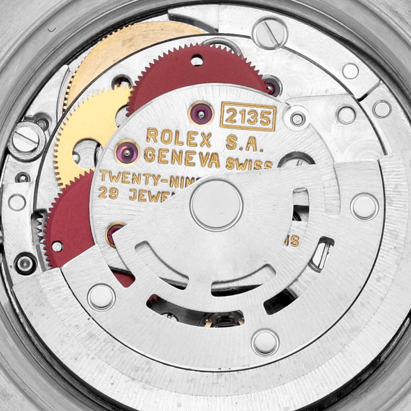 This image shows an internal close-up of the movement of the Rolex Datejust 69173 Women's Steel and Gold (two tone) Black Dial 69173 Women's Steel and Gold (two tone) Black Dial, revealing gears and intricate components.