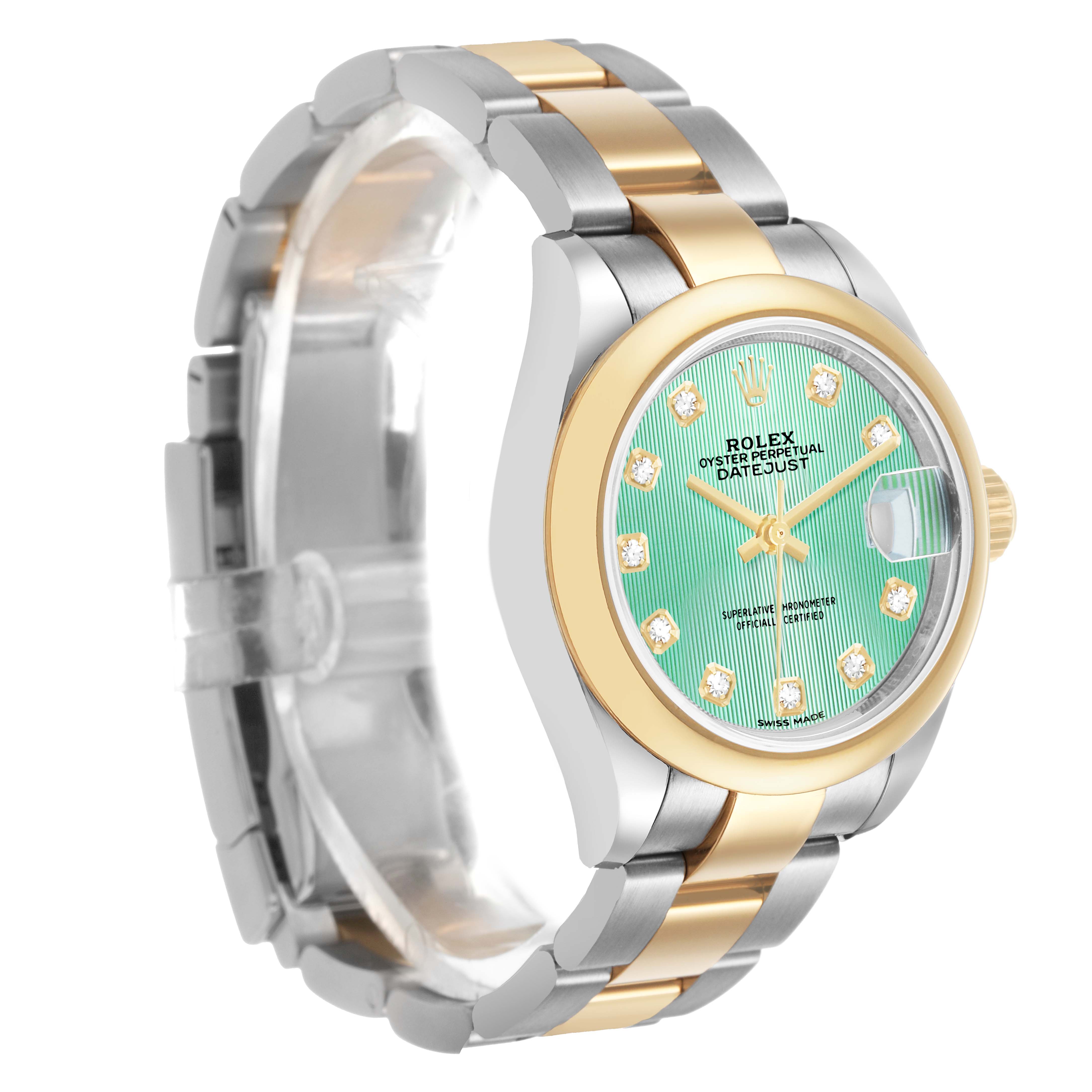 The Rolex Datejust 279163 Women's Steel and Gold (two tone) Green Dial watch is shown from a front-left angle, highlighting its dial, bezel, and bracelet.