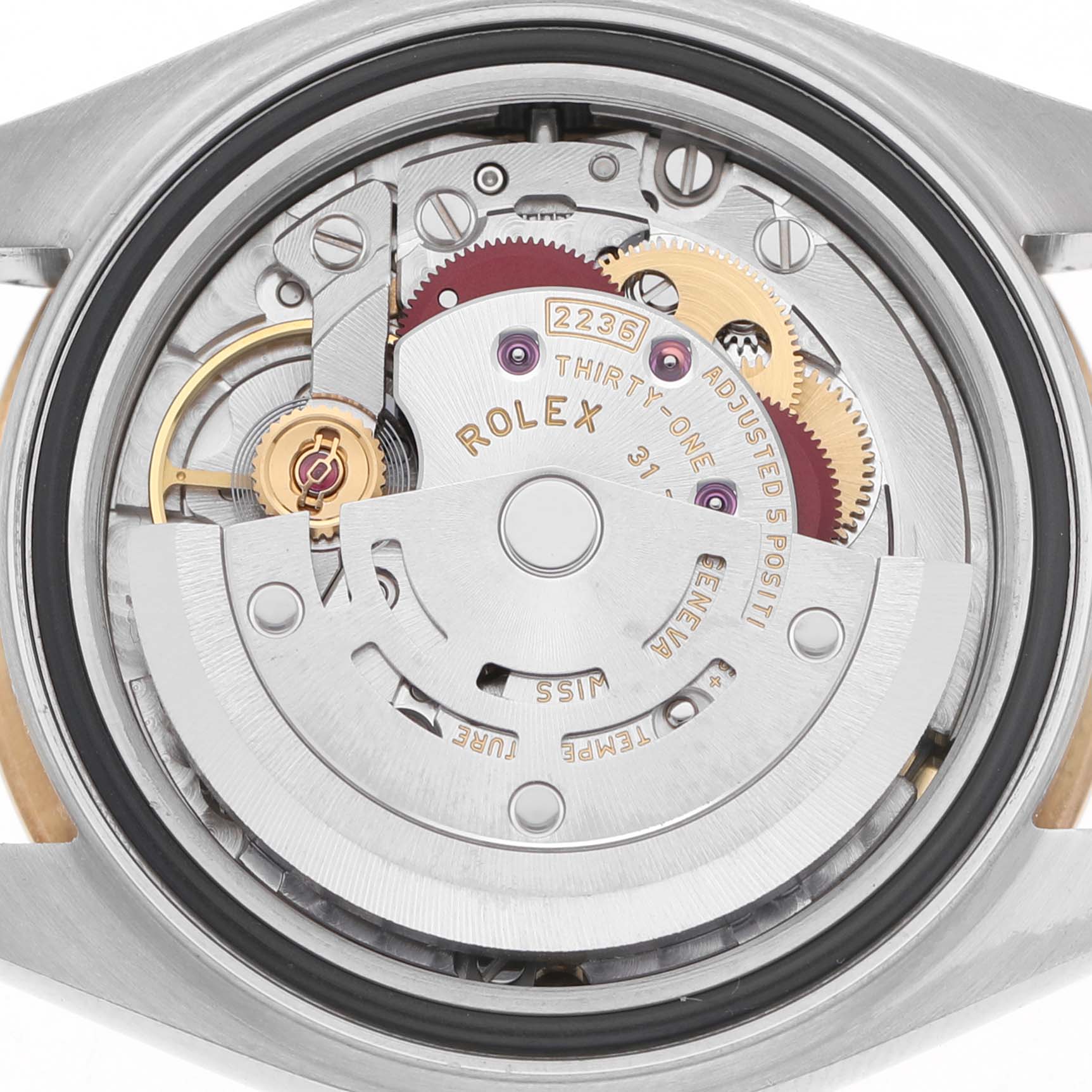 The image shows the open case back of a Rolex Datejust 279383 Women's Steel and Gold (two tone) Green Dial, revealing the intricate movement and rotor mechanism.