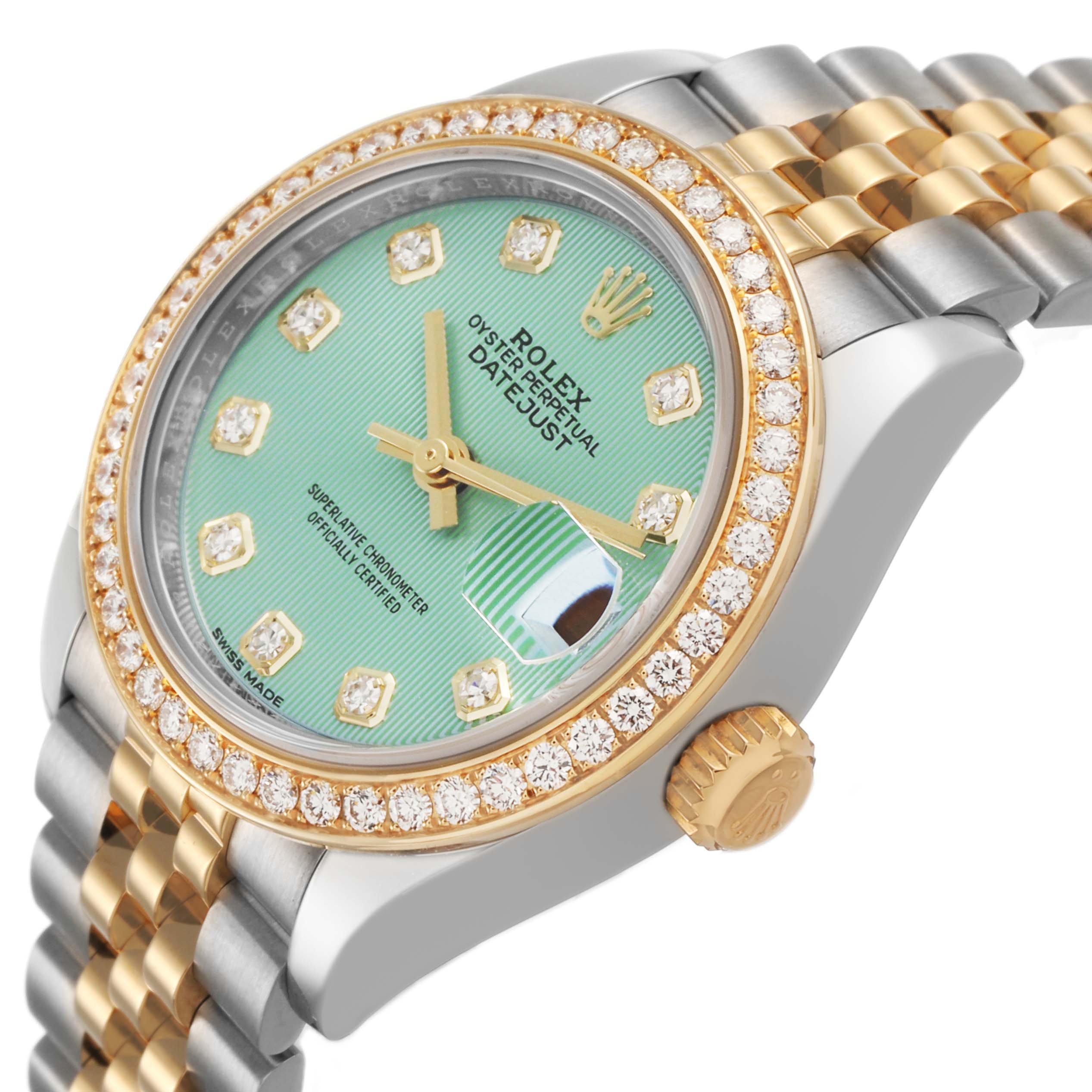 The Rolex Datejust 279383 Women's Steel and Gold (two tone) Green Dial watch is shown at a 3/4 angle, highlighting the bezel, face, and part of the bracelet.