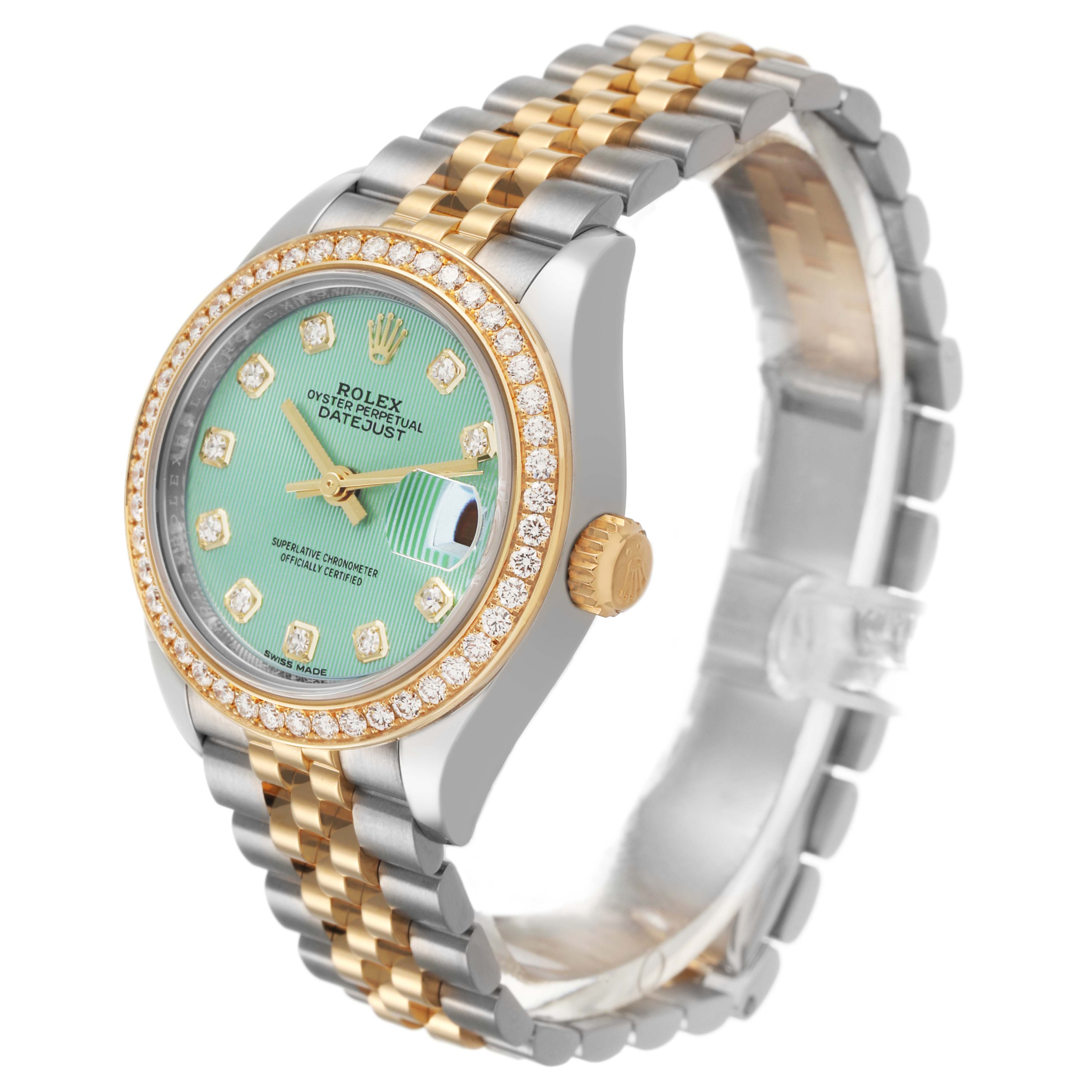 The Rolex Datejust 279383 Women's Steel and Gold (two tone) Green Dial watch is shown at a side angle, highlighting the dial, bezel, crown, and two-tone bracelet.
