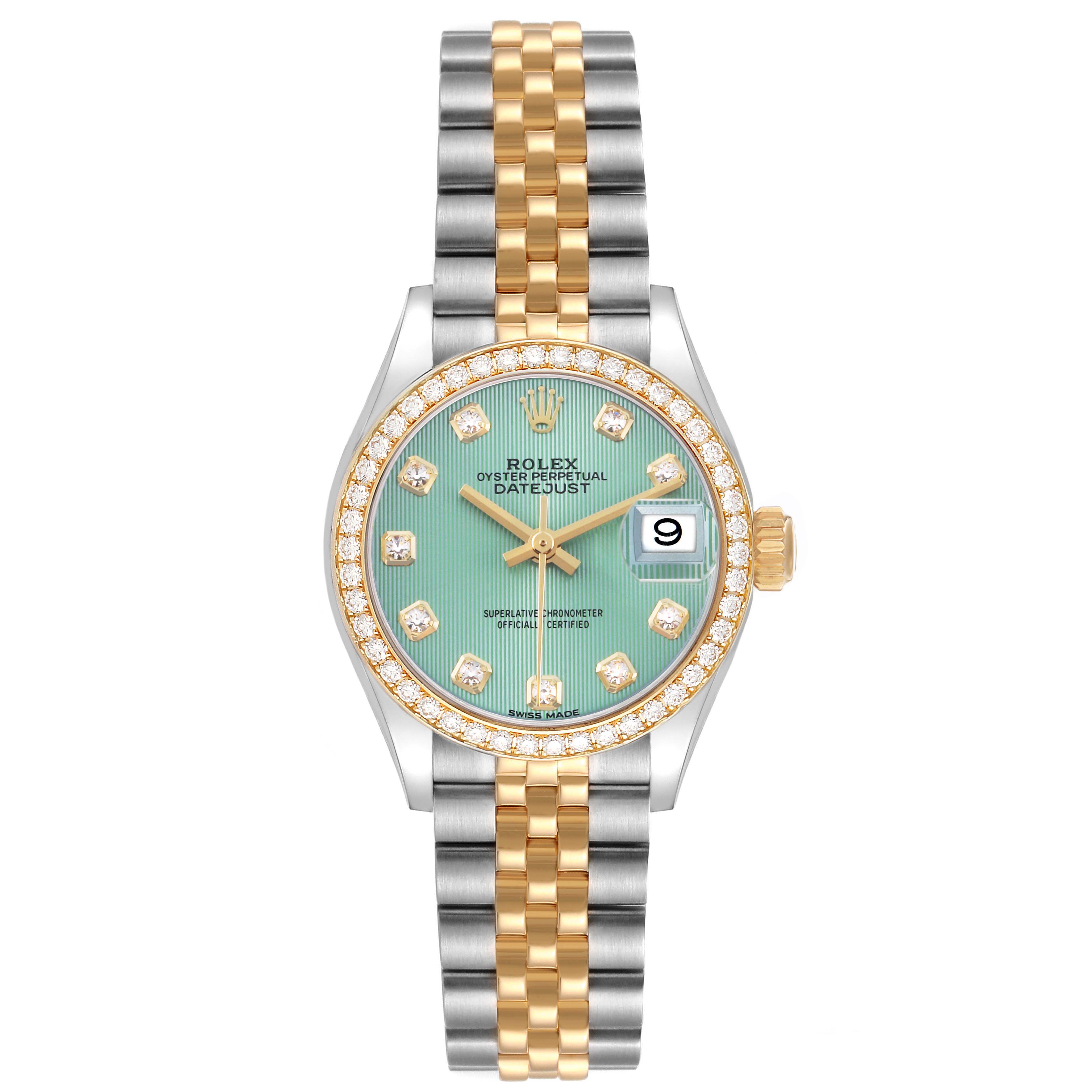 The Rolex Datejust 279383 Women's Steel and Gold (two tone) Green Dial watch is shown from the front, displaying its green dial, diamond markers, two-tone bracelet, and date window.