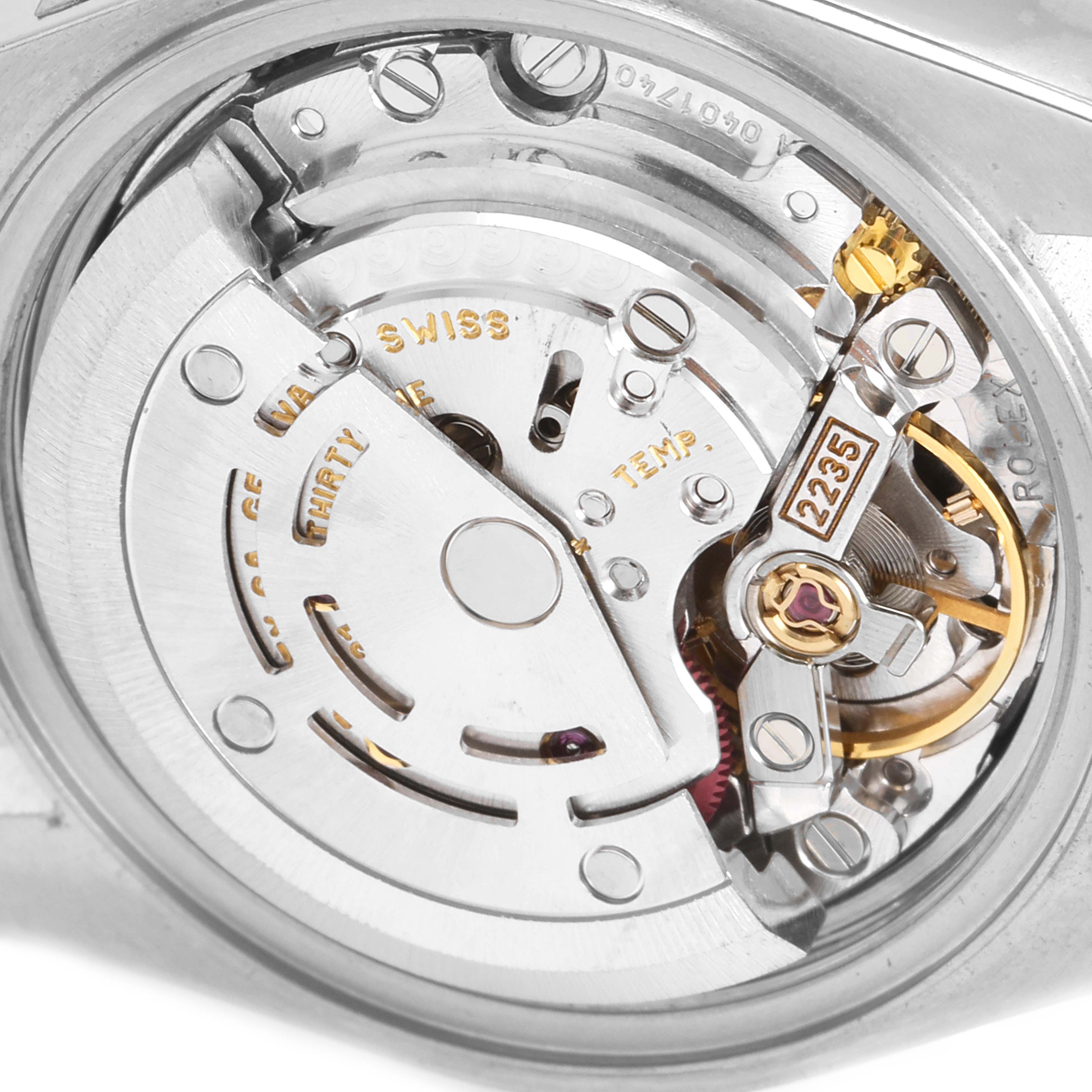 This image shows a close-up view of the movement in a Rolex Datejust 79173 Women
s Steel and Gold (two tone) Silver Dial 79173 Women
s Steel and Gold (two tone) Silver Dial watch, specifically the Rolex caliber 2235.