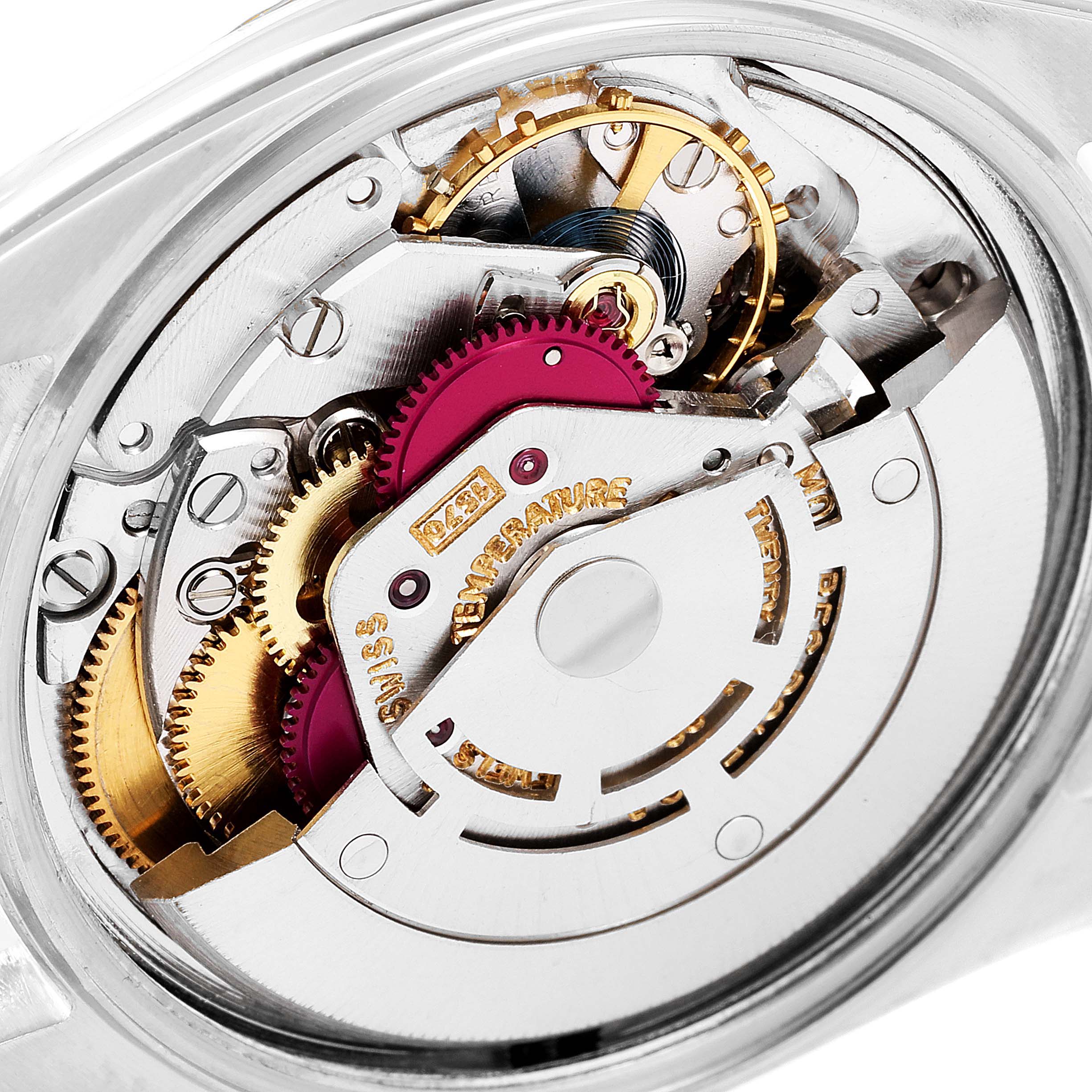 The image shows a close-up of the inner mechanical movement of a Rolex Vintage Collection 1601 Men's Steel and Gold (two tone) Silver Dial 1601 Men's Steel and Gold (two tone) Silver Dial watch.