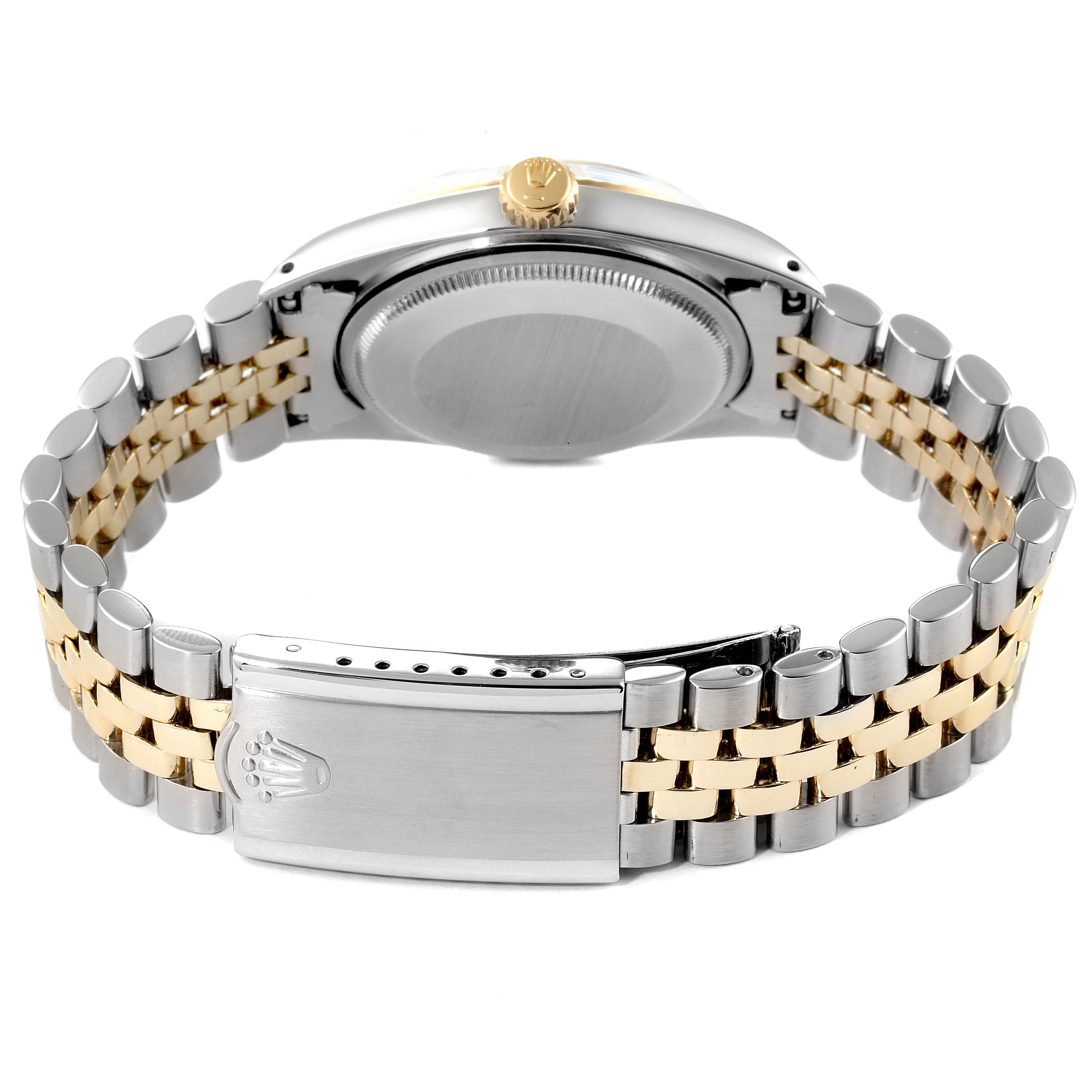 The image shows the back and clasp of a Rolex Vintage Collection 1601 Men's Steel and Gold (two tone) Silver Dial 1601 Men's Steel and Gold (two tone) Silver Dial watch, highlighting its two-tone bracelet in gold and silver.