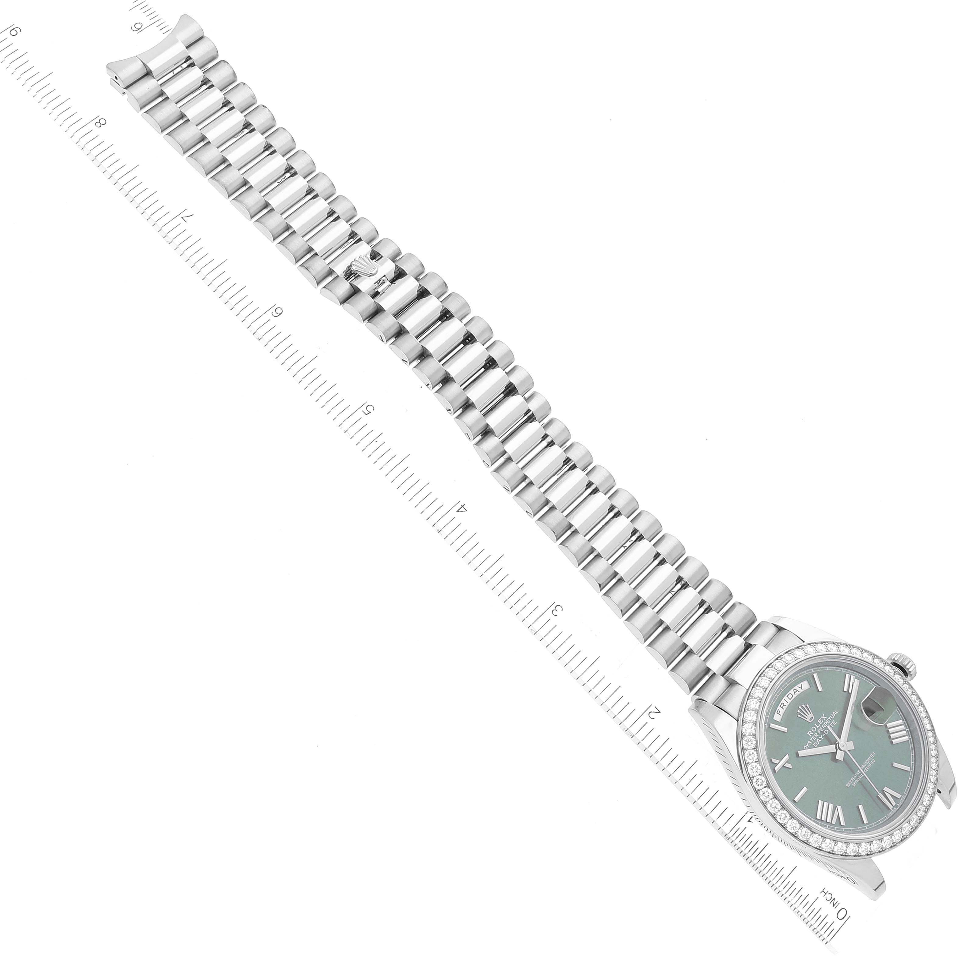 The image shows a Rolex President 228349 Men's White Gold Green Dial 228349 Men's White Gold Green Dial model watch at a top-down angle, displaying the watch face and bracelet alongside a ruler for scale.