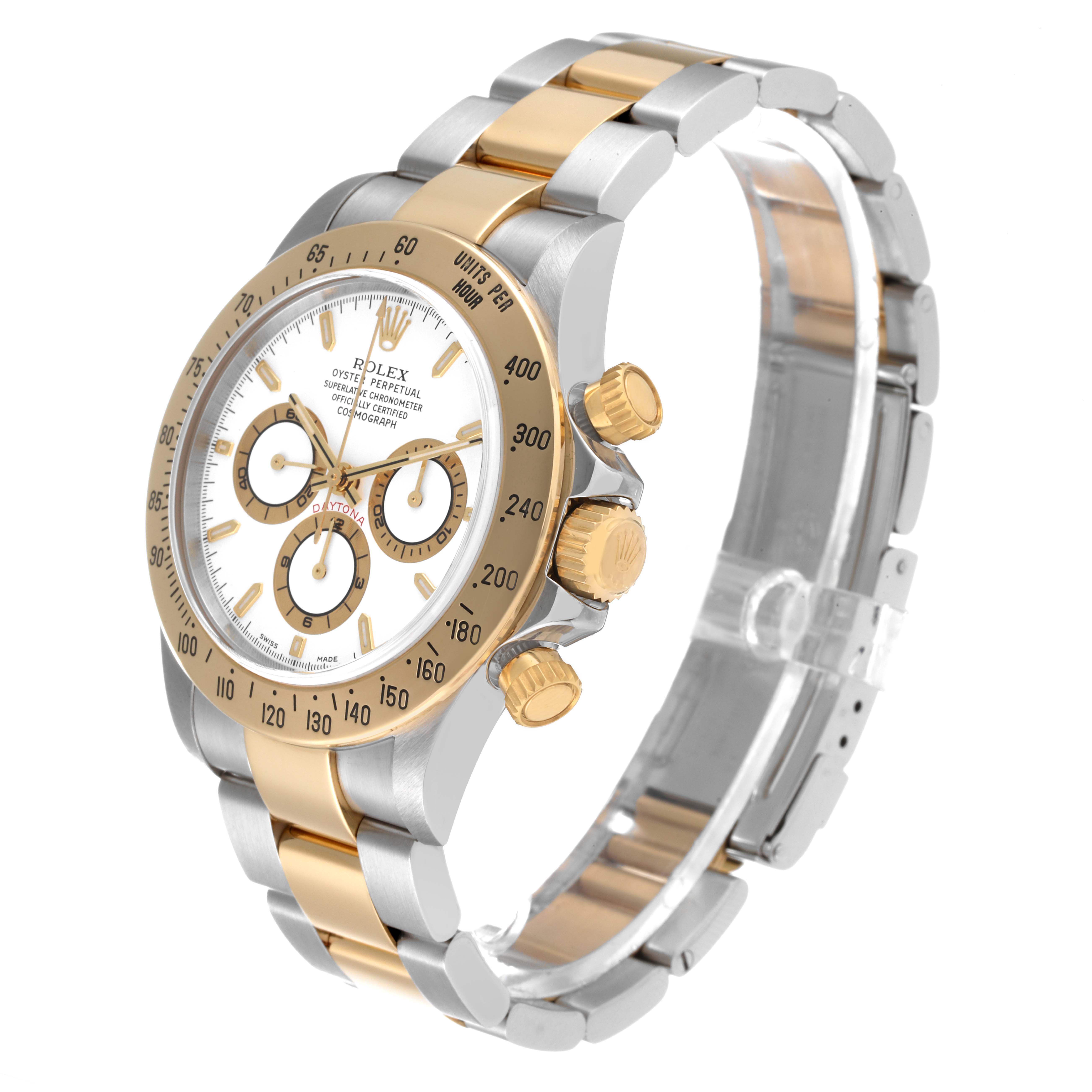 The image shows a side angle of a Rolex Daytona 16523 Men
s Steel and Gold (two tone) White Dial 16523 Men
s Steel and Gold (two tone) White Dial watch, highlighting its bezel, dial, crown, pushers, and mixed metal bracelet.