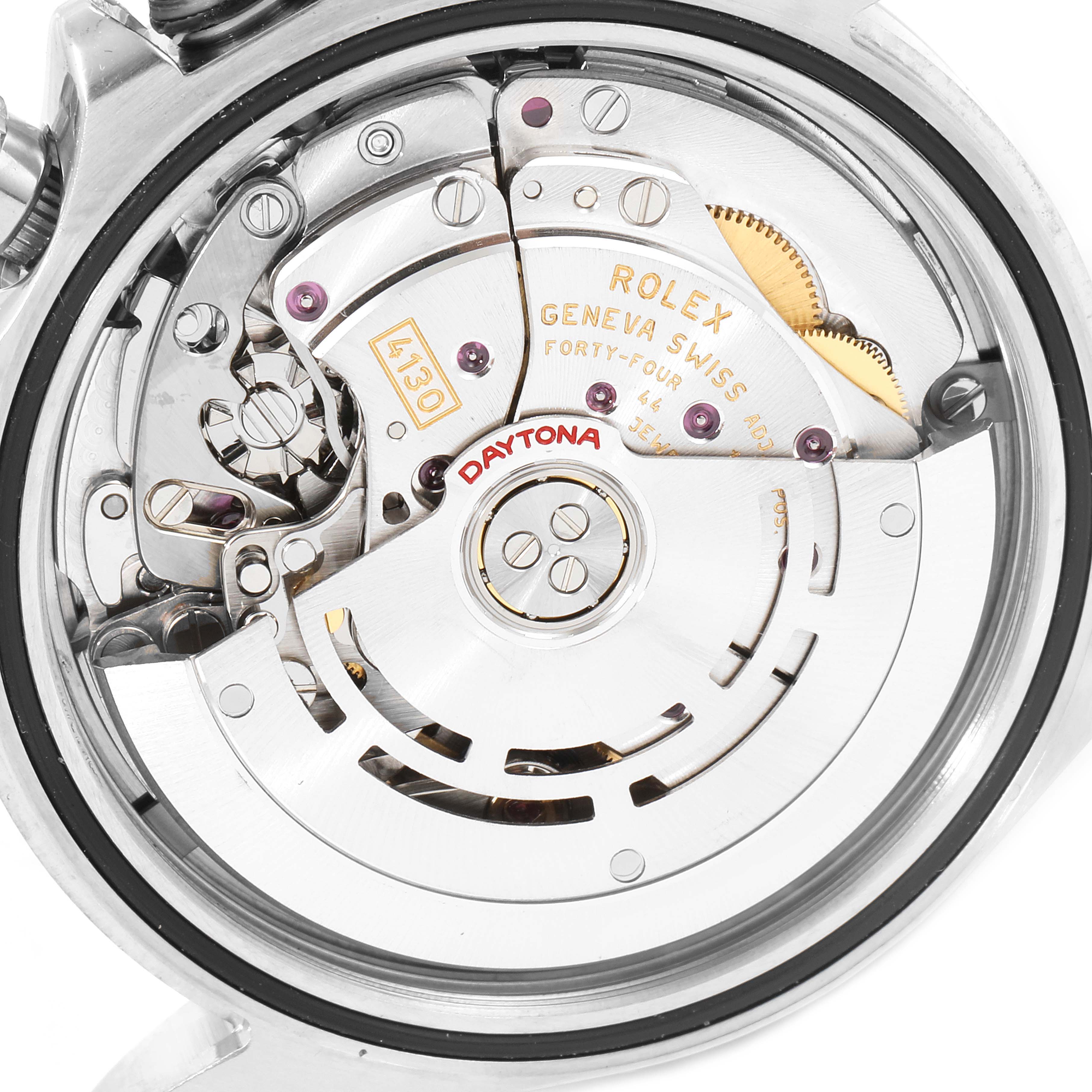 The image shows the internal mechanism of the Rolex Daytona 116520 Men
s Stainless Steel White Dial 116520 Men
s Stainless Steel White Dial watch from a close-up angle, revealing its intricate components.