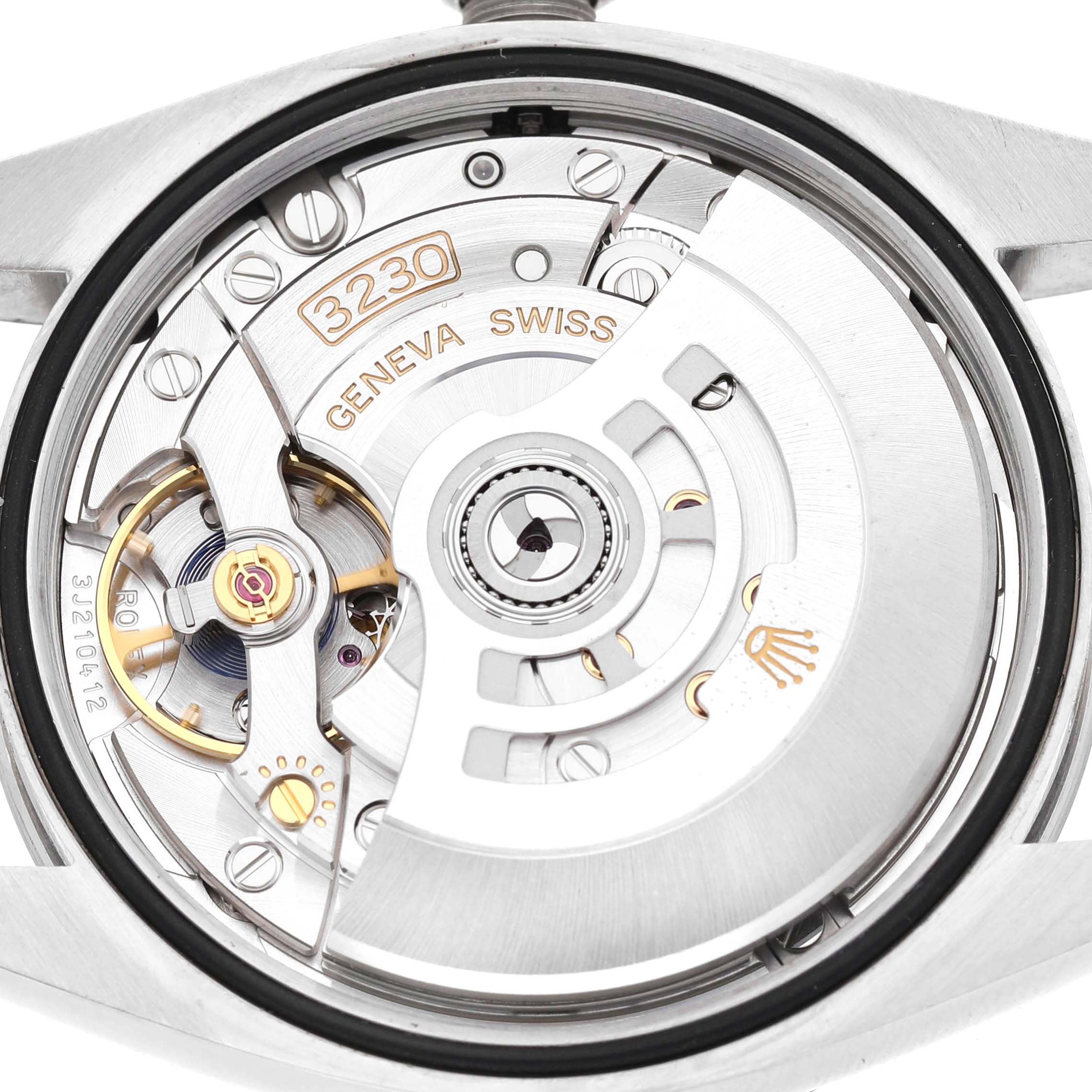 The image shows the movement of the Rolex Explorer 124270 Men's Stainless Steel Black Dial watch, highlighting the rotor and engravings from a back view.