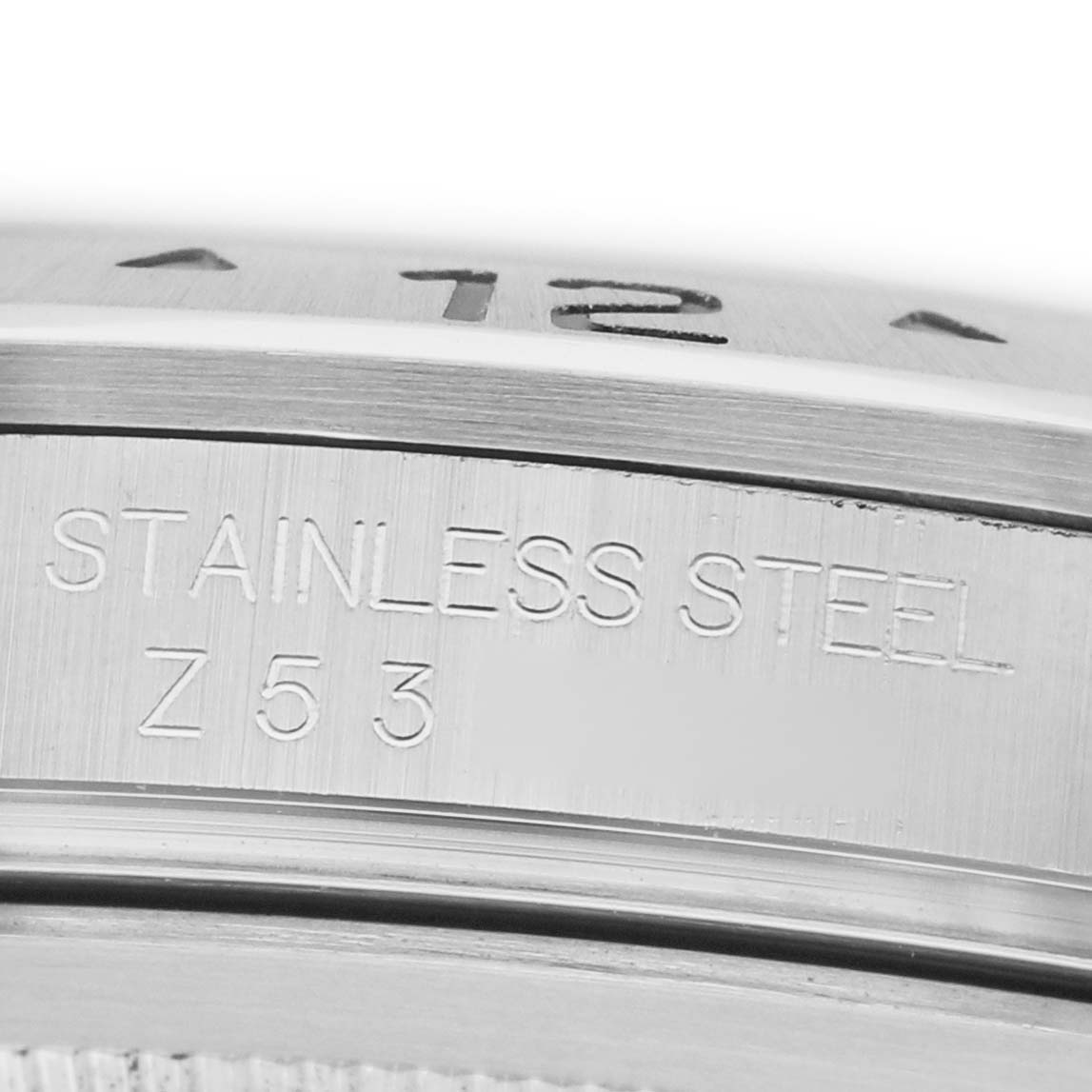 The image shows a close-up of the Rolex Explorer 16570 Men's Stainless Steel White Dial model, focusing on the stainless steel engraving on the side.