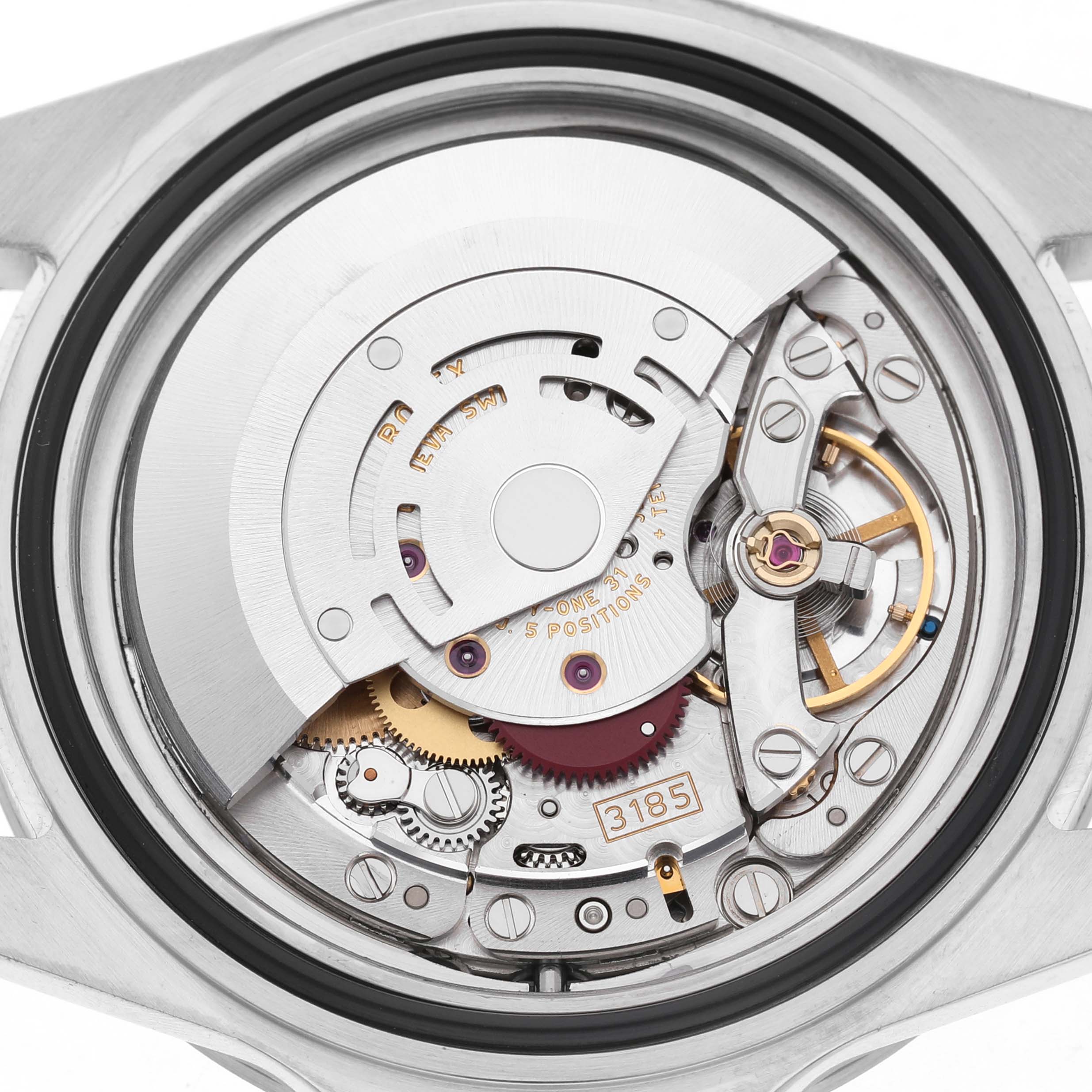 The image shows the movement and internal mechanics of a Rolex Explorer 16570 Men's Stainless Steel White Dial watch from a back angle.
