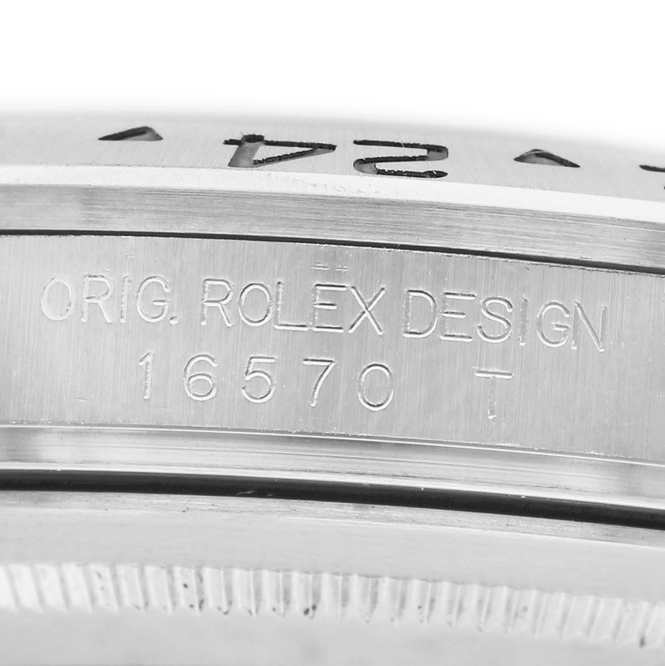 The image shows the side engraving of a Rolex Explorer 16570 Men's Stainless Steel White Dial 16570, highlighting the design markings.