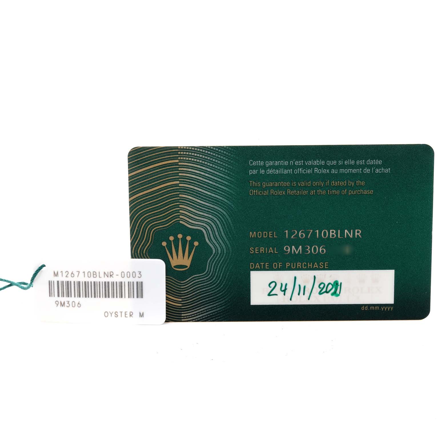 The image shows the warranty card and tag for a Rolex GMT-Master 126710 Men's Stainless Steel Black Dial 126710 Men's Stainless Steel Black Dial model 126710BLNR with the serial number 9M306.