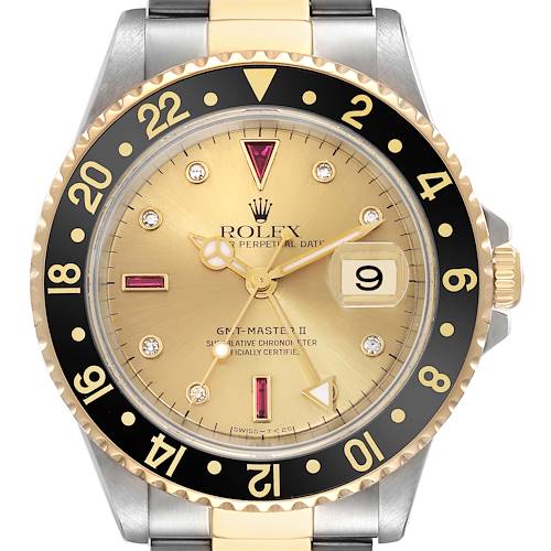 This image shows a front view of the Rolex GMT-Master II watch, highlighting its gold dial, black bezel, and date window at the 3 o'clock position.