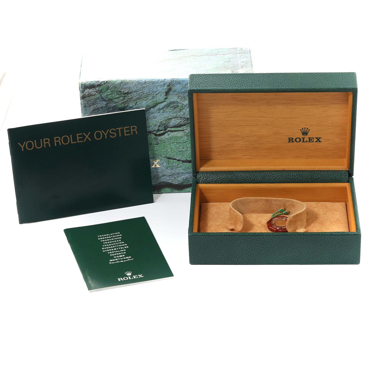 This image shows the open box and documentation for a Rolex GMT-Master 16713 Men's Steel and Gold (two tone) Champagne Dial 16713 Men's Steel and Gold (two tone) Champagne Dial watch, including the outer box, display box, and booklets.