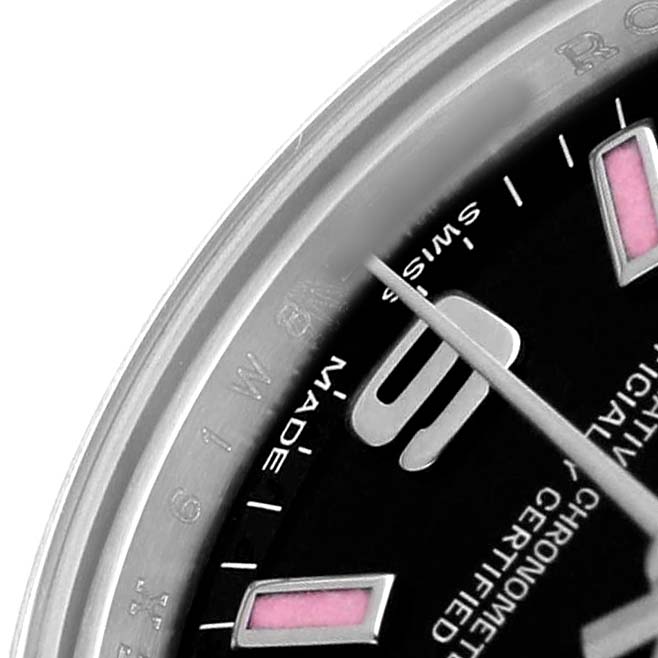 The image shows a close-up of the face and bezel of a Rolex Oyster Perpetual 176200 Women's Stainless Steel Black Dial, highlighting its markers and part of the second hand.