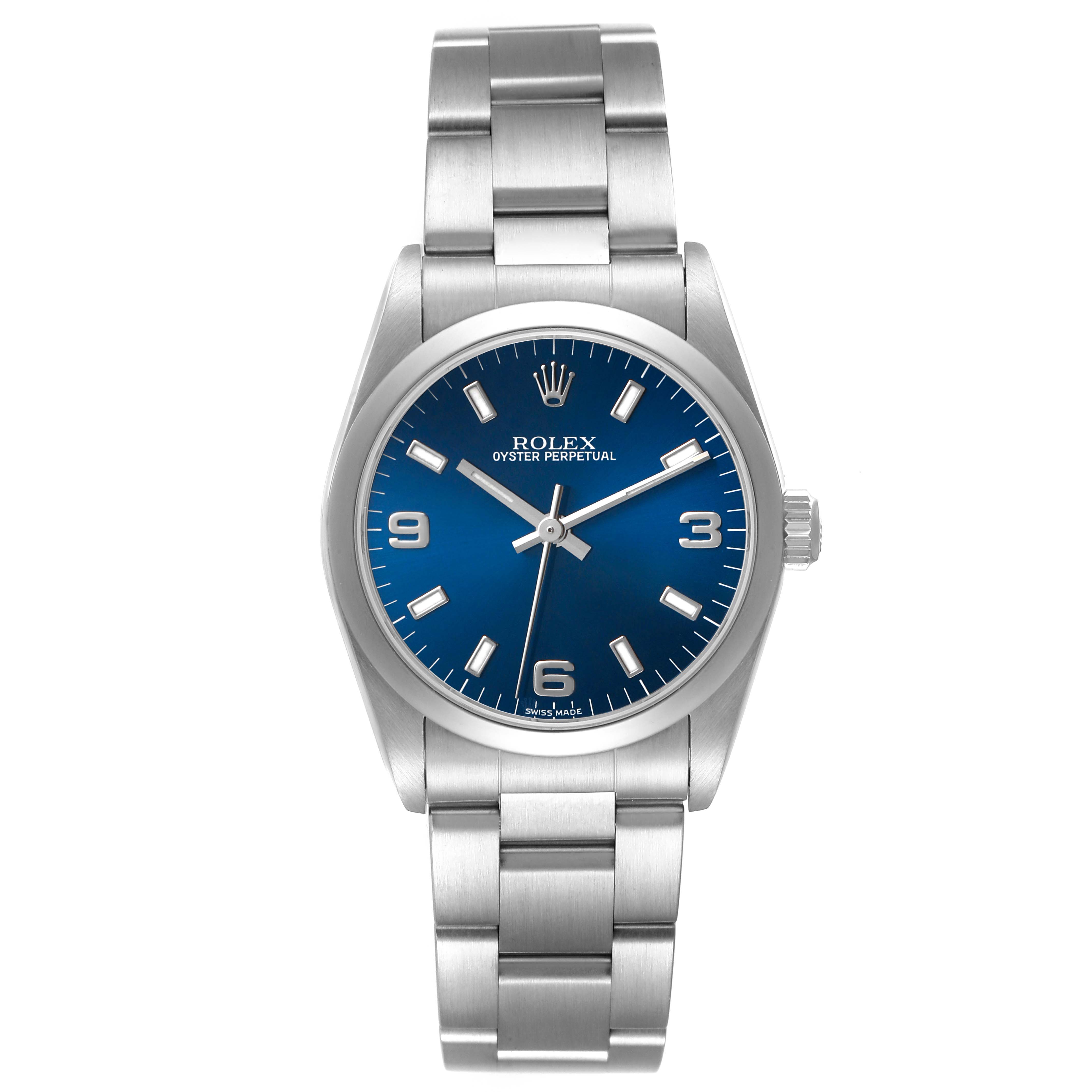 The Rolex Mid-Size 77080 Women's Stainless Steel Blue Dial model is shown from a front angle, displaying the dial, case, and bracelet.