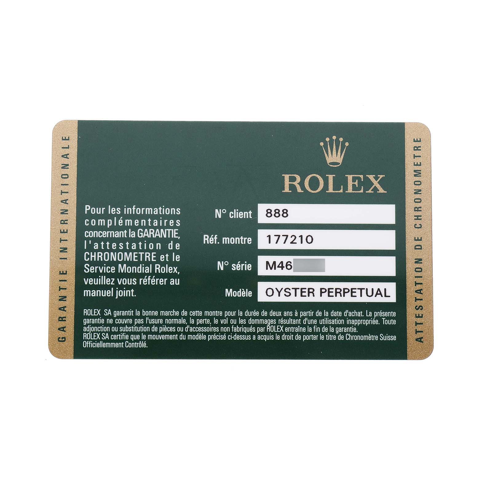 The image shows a guarantee card for the Rolex Oyster Perpetual Mid-Size model, displaying details like model and serial numbers.