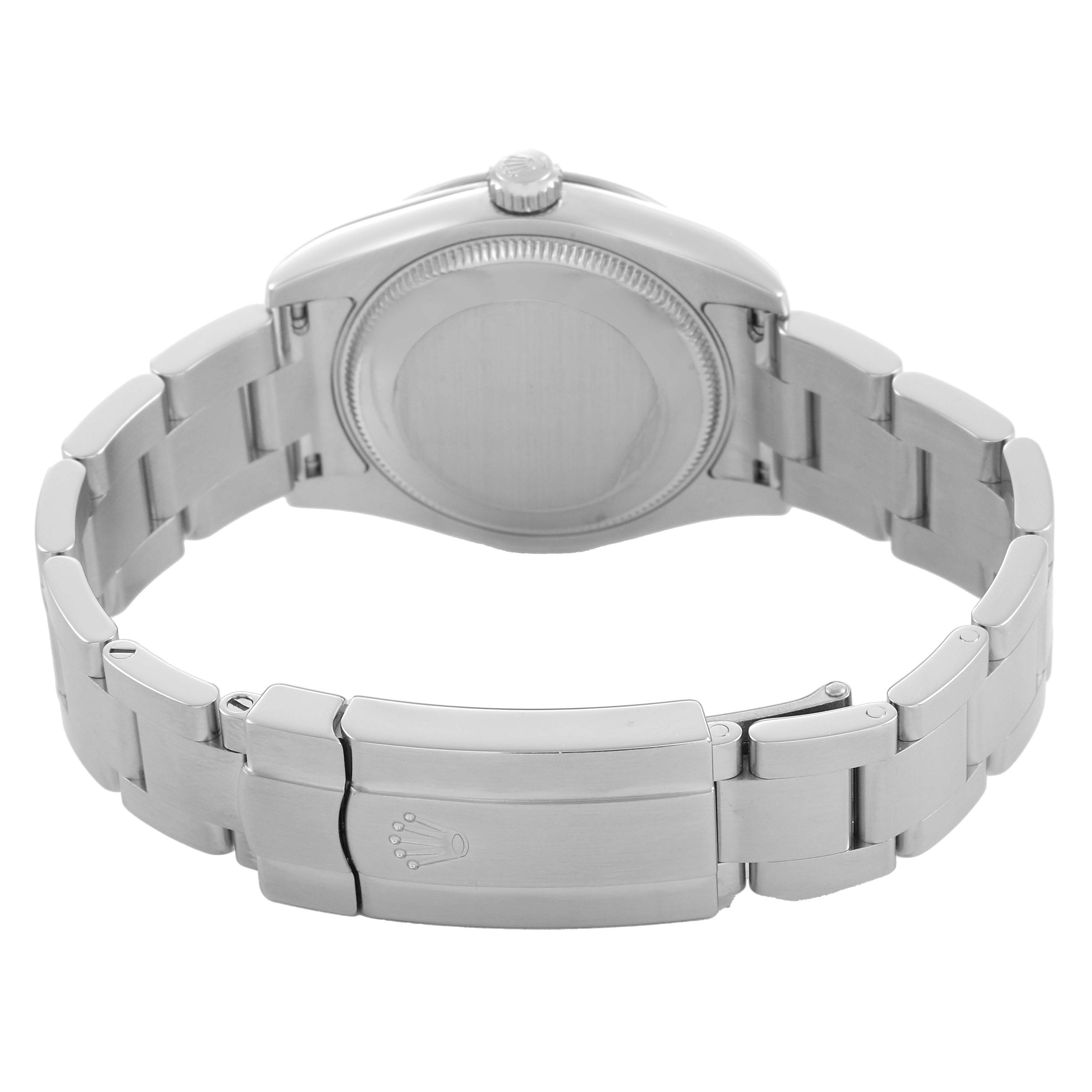The image shows the back view of a Mid-Size Rolex watch, highlighting the clasp and bracelet.