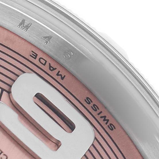 The image shows a close-up of the dial edge and bezel of a Rolex Mid-Size 177210 Women's Stainless Steel Pink Dial watch, highlighting the "SWISS MADE" text.