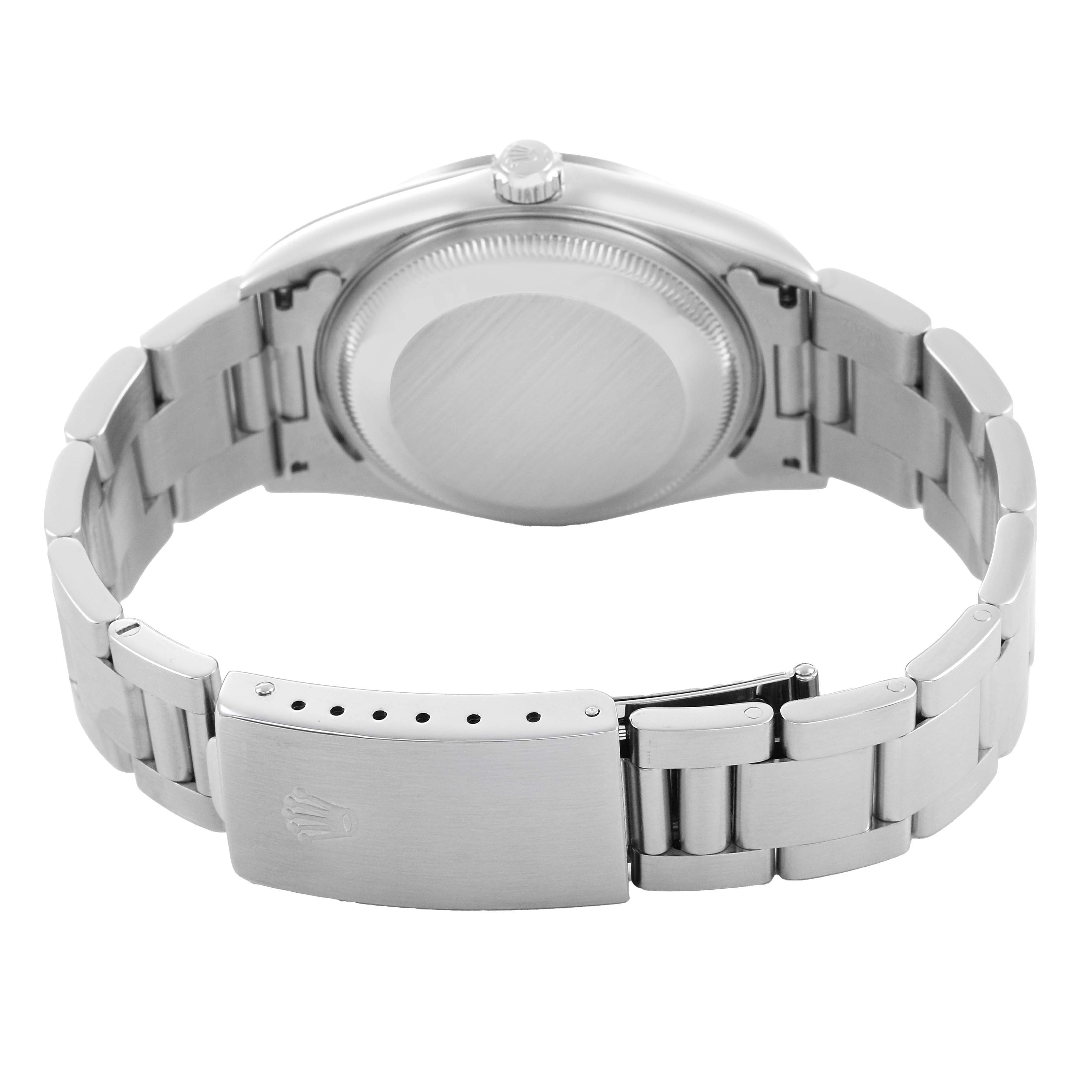 The image shows the back case and clasp of a Rolex Date 15200 Men's Stainless Steel White Dial model watch, displaying its bracelet and engraved logo.