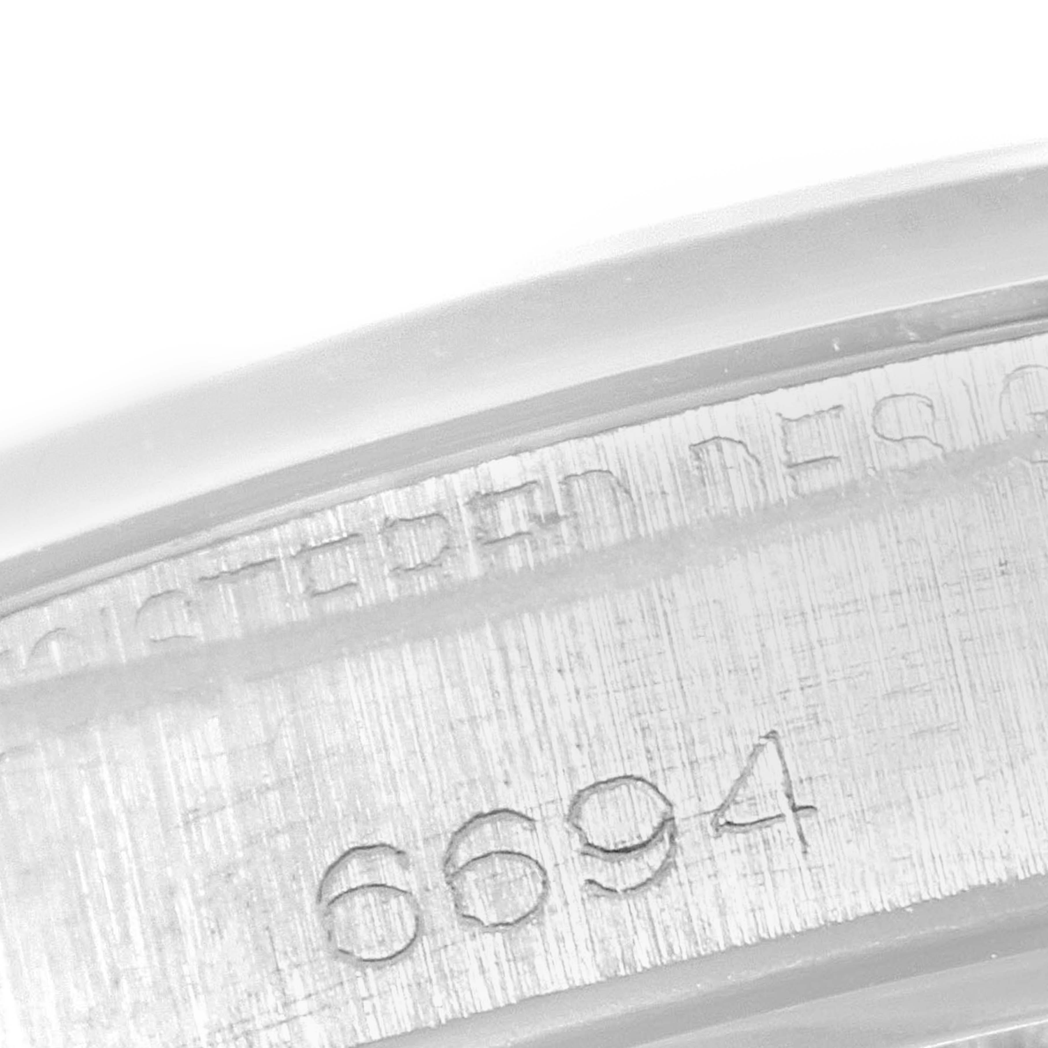 This close-up image shows the inside of the case of the Rolex Vintage Collection 6694 Men's Stainless Steel Champagne Dial 6694 Men's Stainless Steel Champagne Dial model, displaying the reference number "6694."