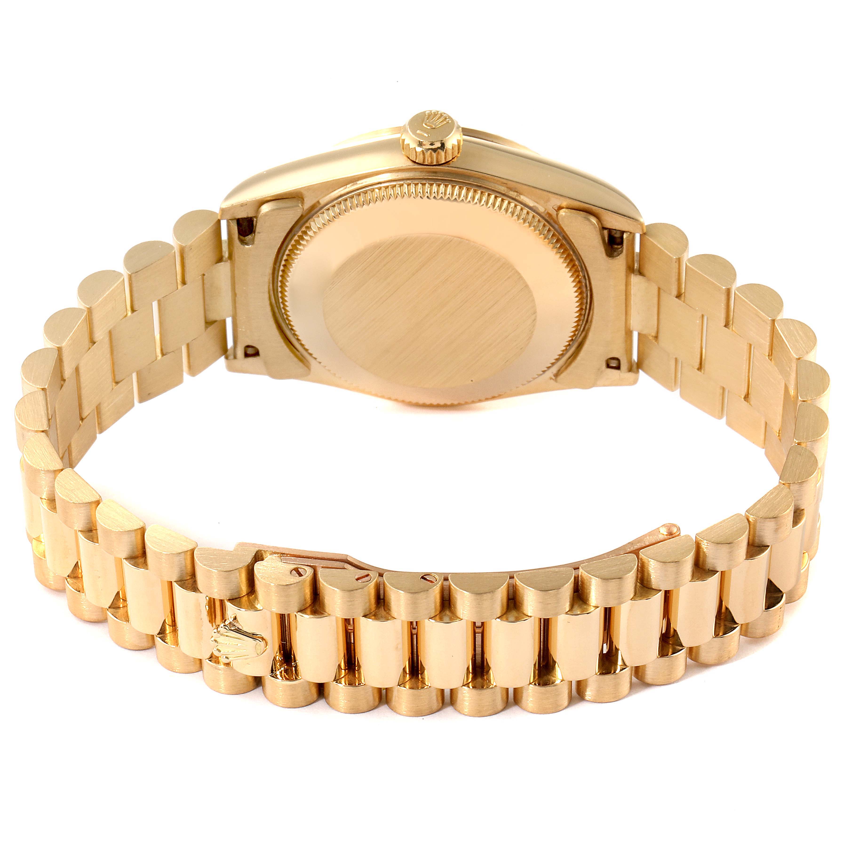 This image shows the back view of a Rolex President 68278 Women
s Yellow Gold Champagne Dial 68278 Women
s Yellow Gold Champagne Dial model watch, including its case, crown, and bracelet.