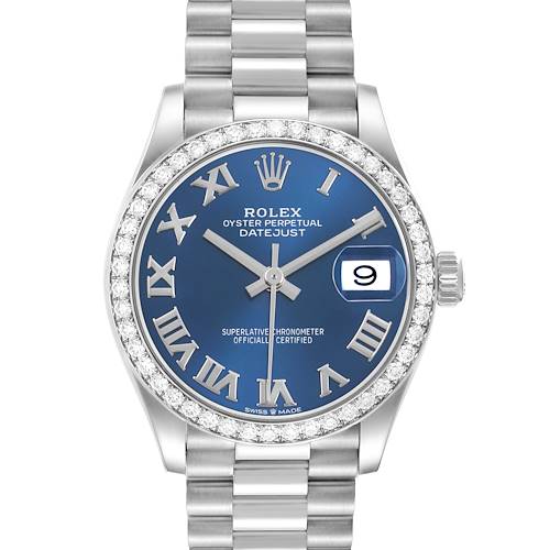 The Rolex President 278289 Women's White Gold Blue Dial model is shown from the front, highlighting its blue dial, Roman numerals, date window, and diamond bezel.