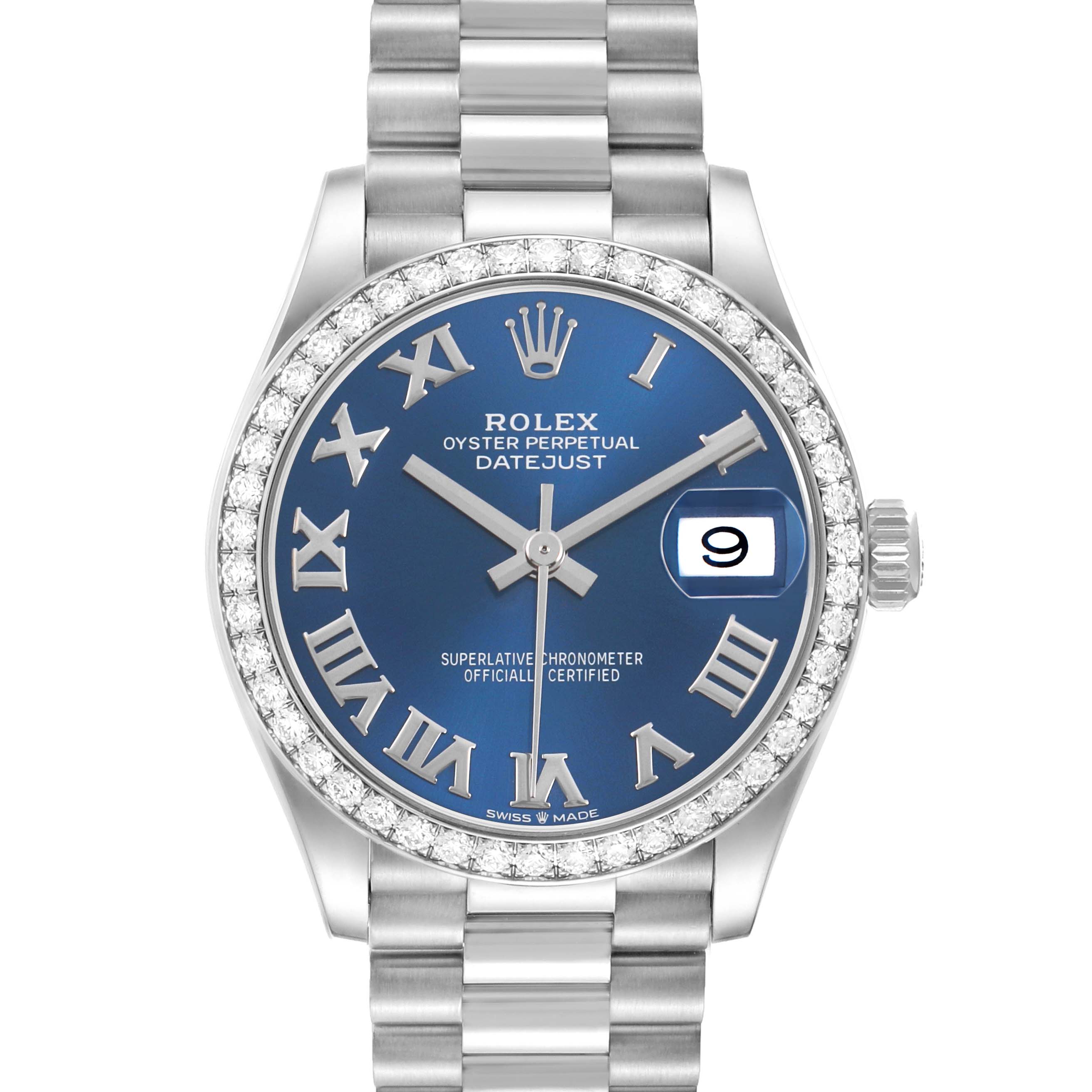 The Rolex President 278289 Women's White Gold Blue Dial model is shown from a top-down angle, displaying its blue dial, Roman numerals, diamond bezel, and metal bracelet.