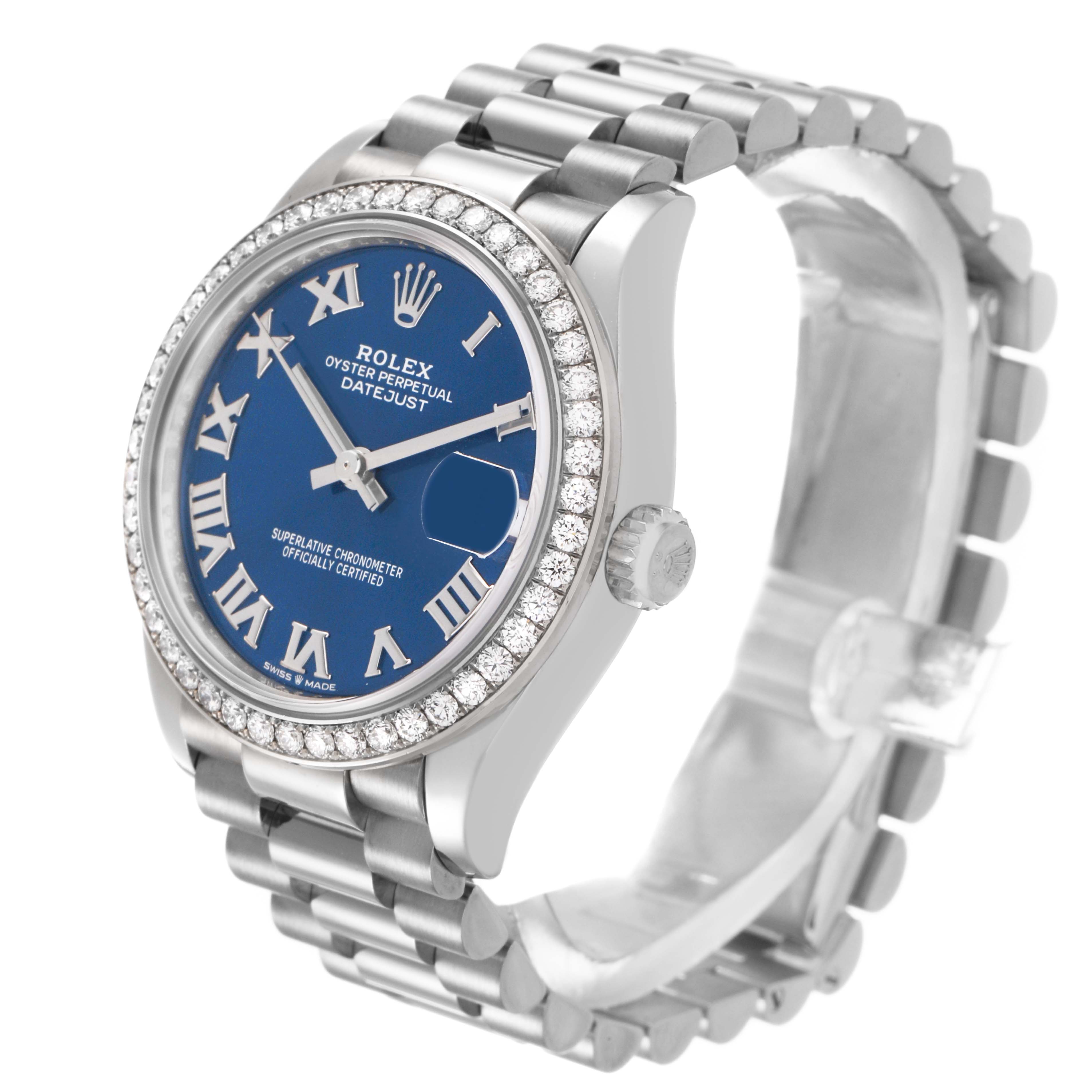 The Rolex President 278289 Women's White Gold Blue Dial model watch is shown at an angle highlighting the blue dial, diamond bezel, and silver bracelet.