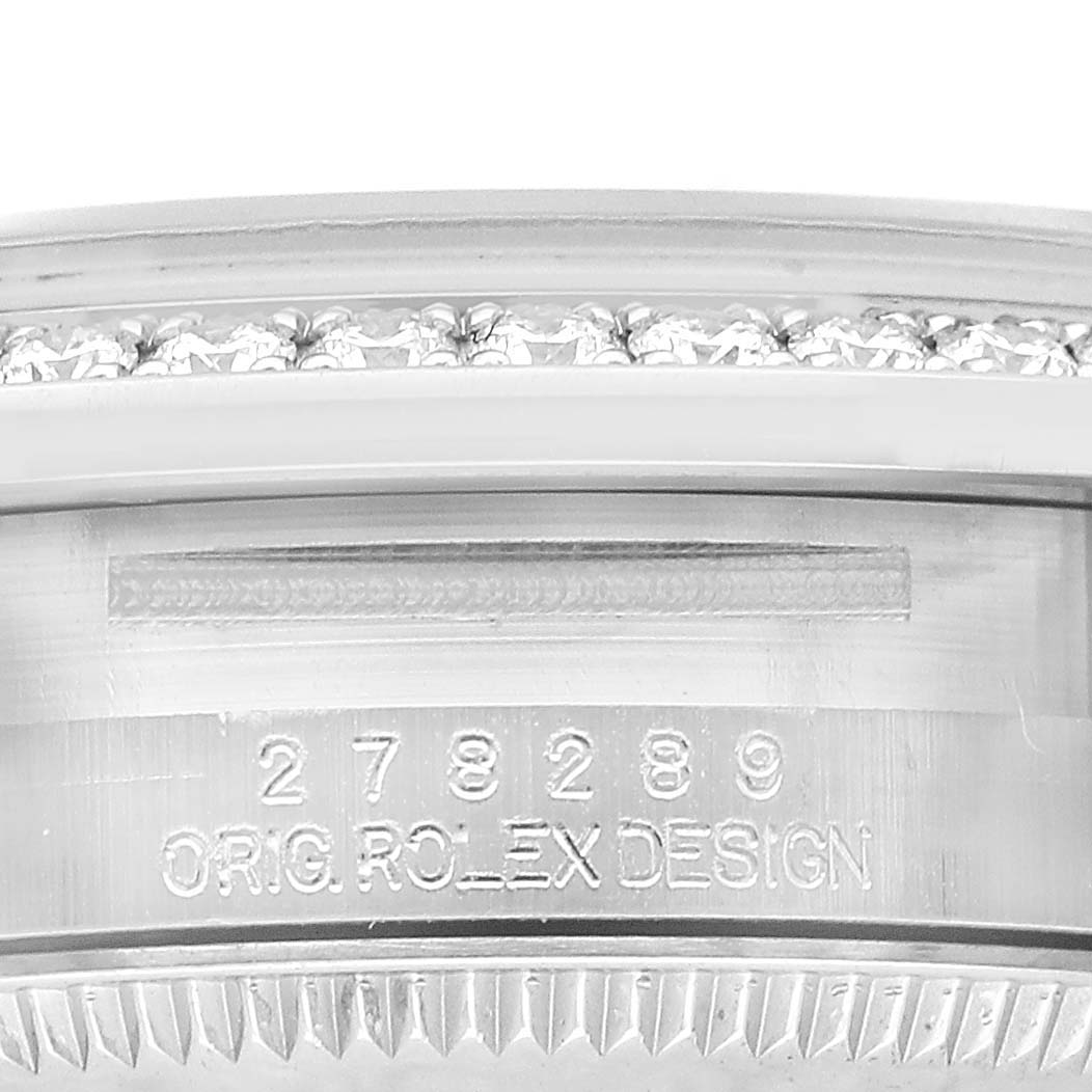 The image shows the side view of a Rolex Mid-Size 278289 Women's White Gold Mother of Pearl Dial watch, highlighting the engraved serial number and "Orig Rolex Design."