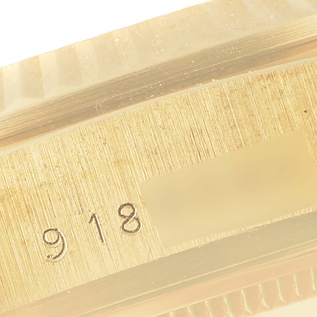 This image shows a close-up of the side engraving on the bezel of the Rolex President 18038 Men
s Yellow Gold Champagne Dial 18038 Men
s Yellow Gold Champagne Dial model watch.